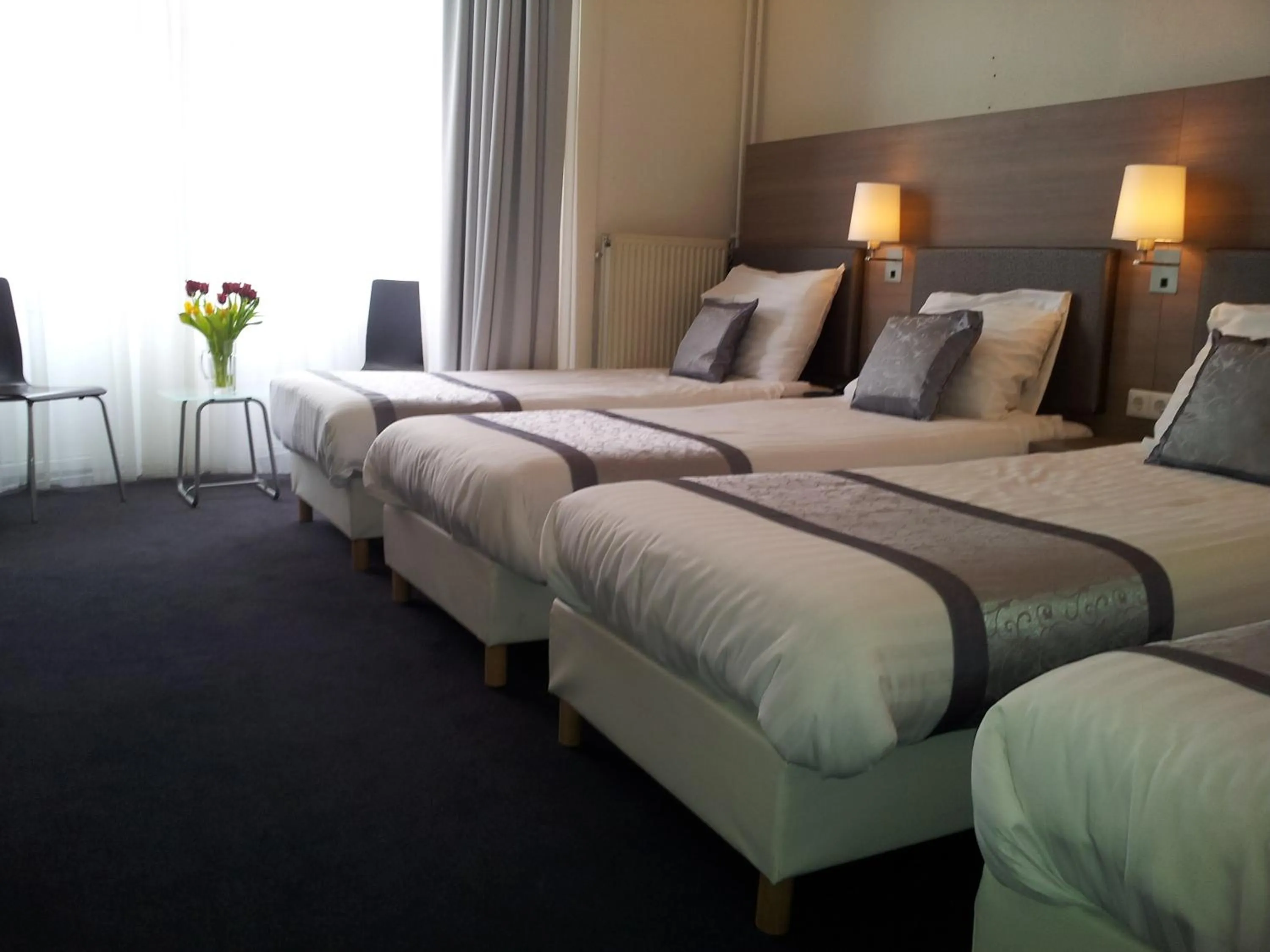 Bed in The Concert Hotel