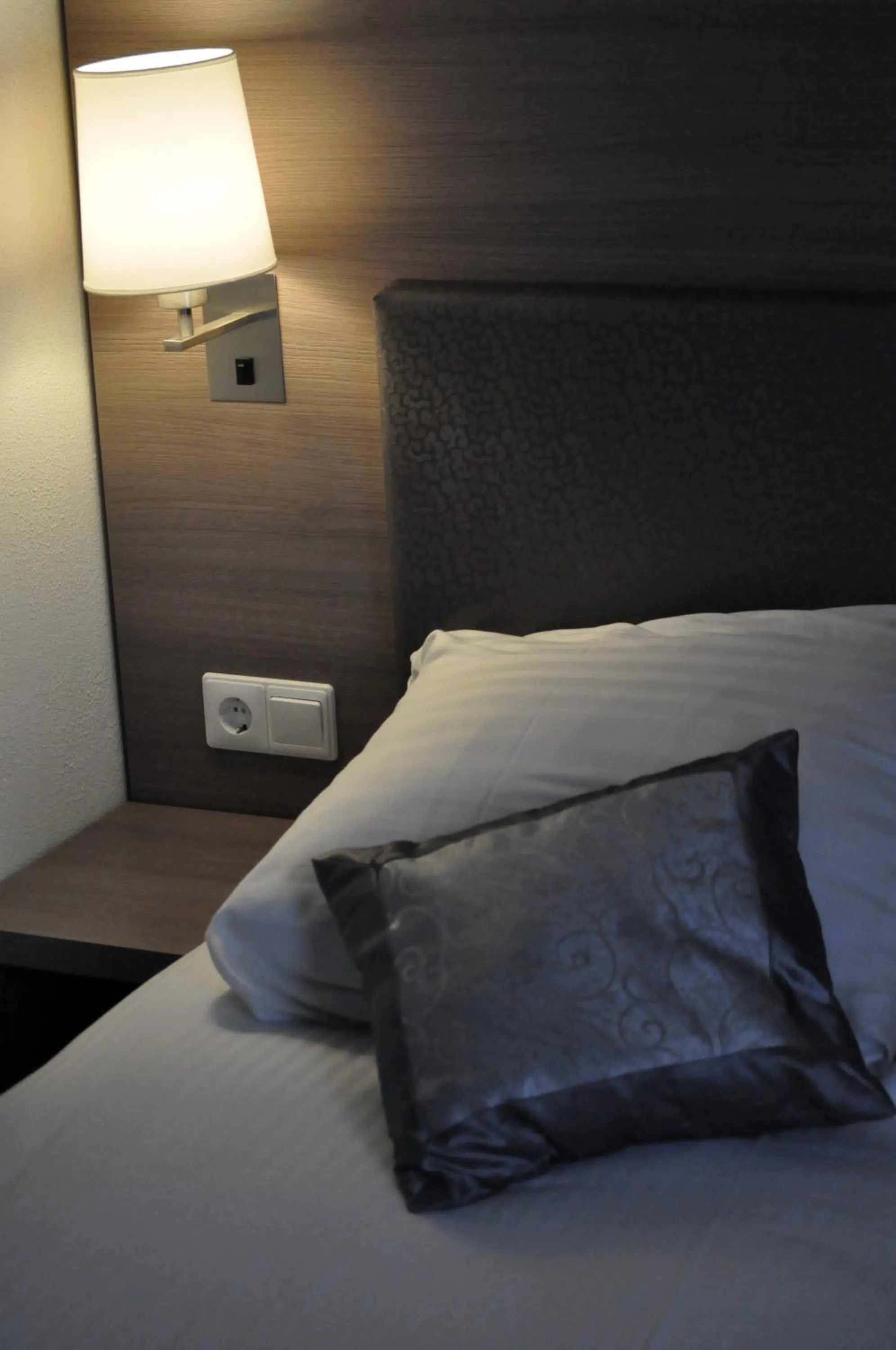 Bed in The Concert Hotel