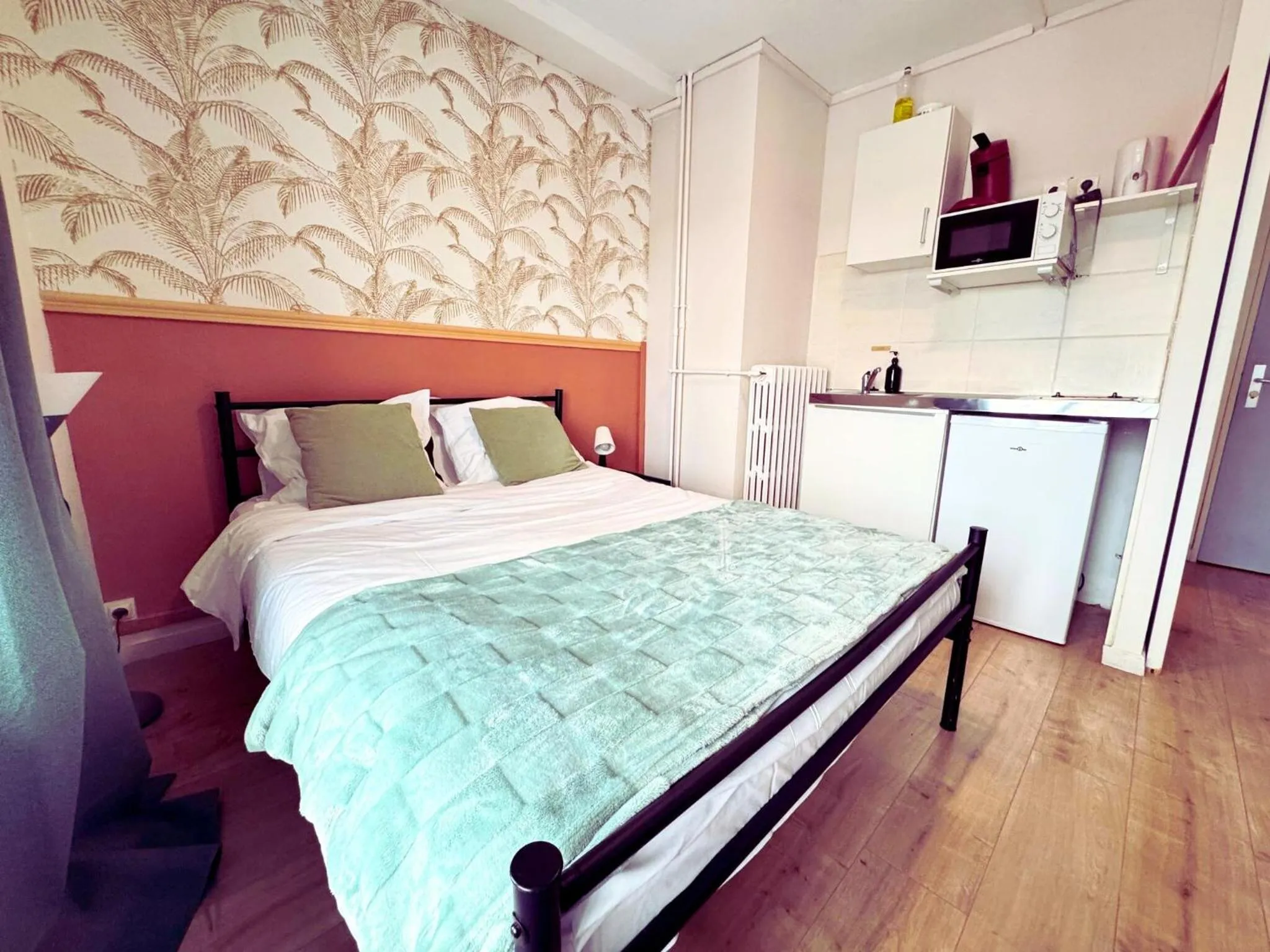 Bed in L'Escale Appartements et Suites en bord de Mer