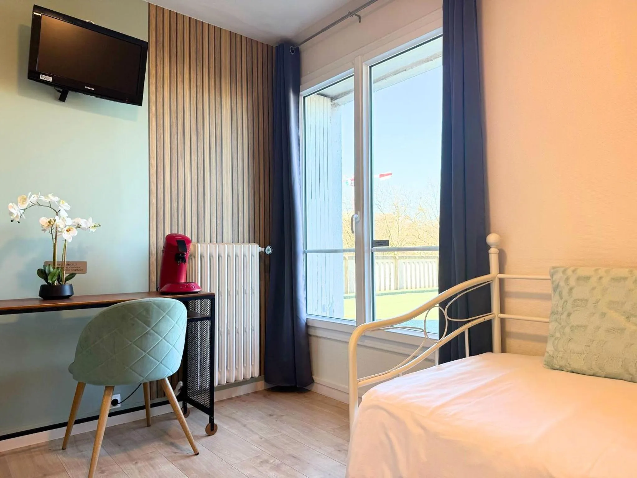 Bed in L'Escale Appartements et Suites en bord de Mer