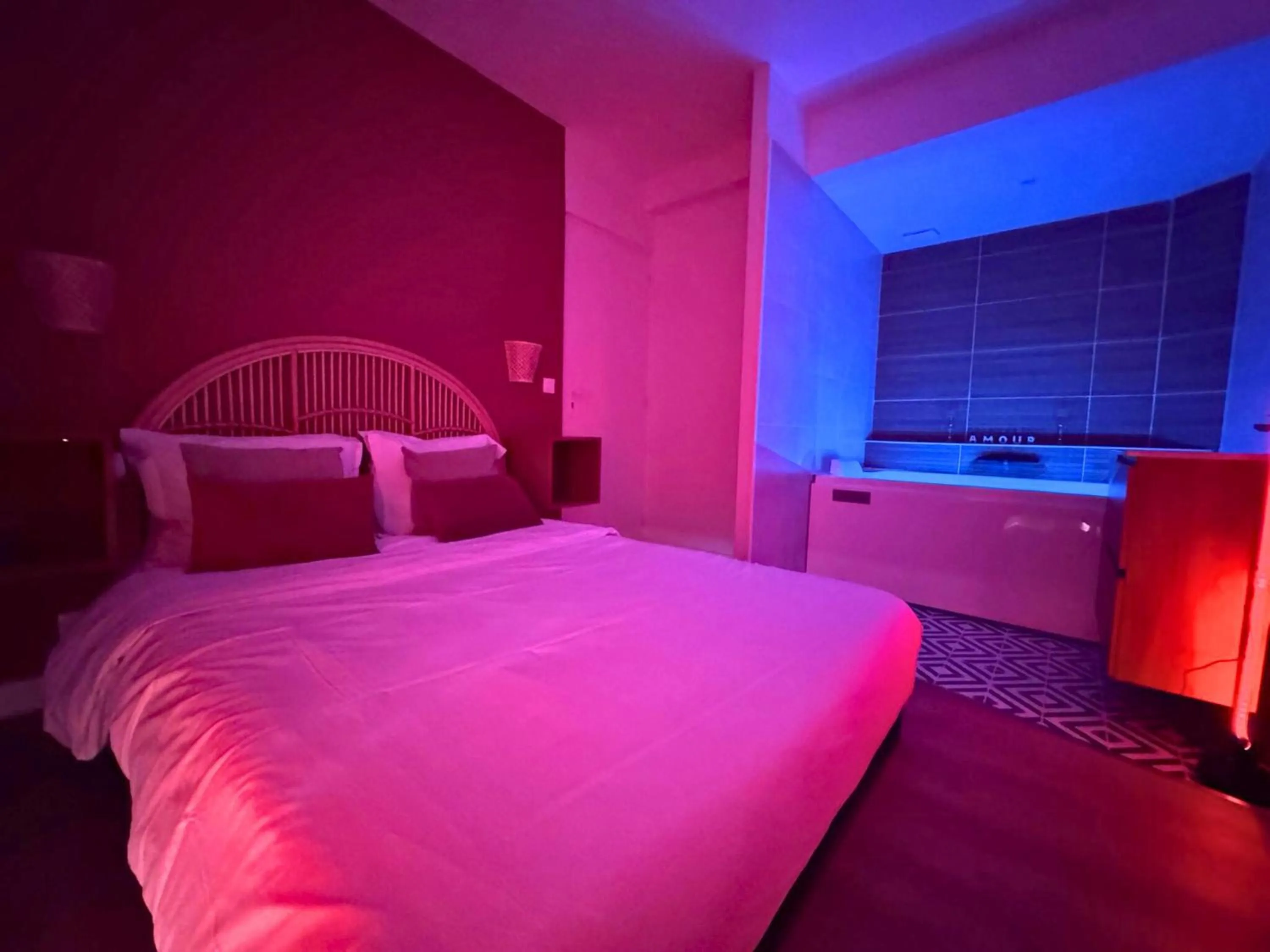 Bed in L'Escale Appartements et Suites en bord de Mer