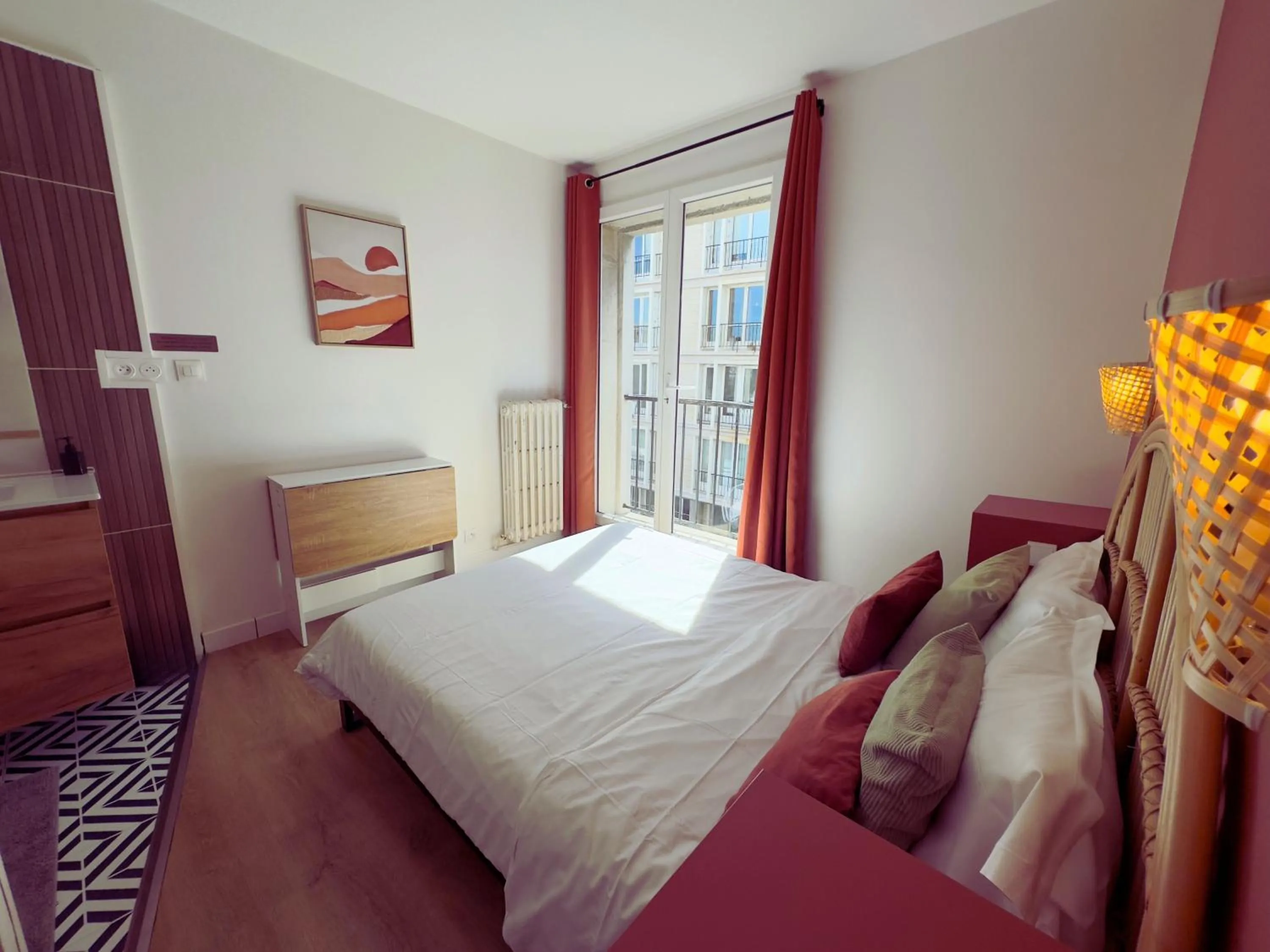 Bed in L'Escale Appartements et Suites en bord de Mer