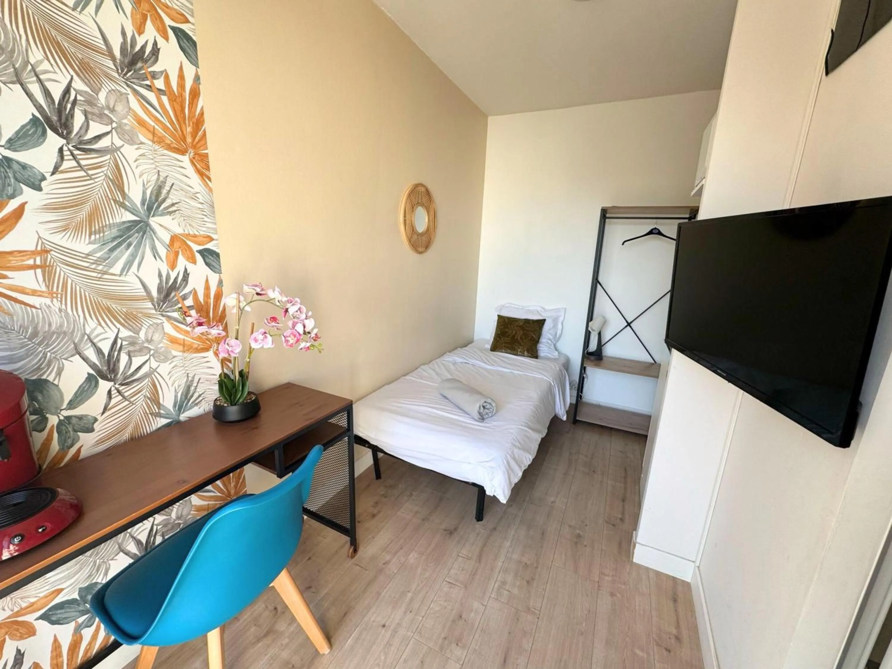 Bed in L'Escale Appartements et Suites en bord de Mer