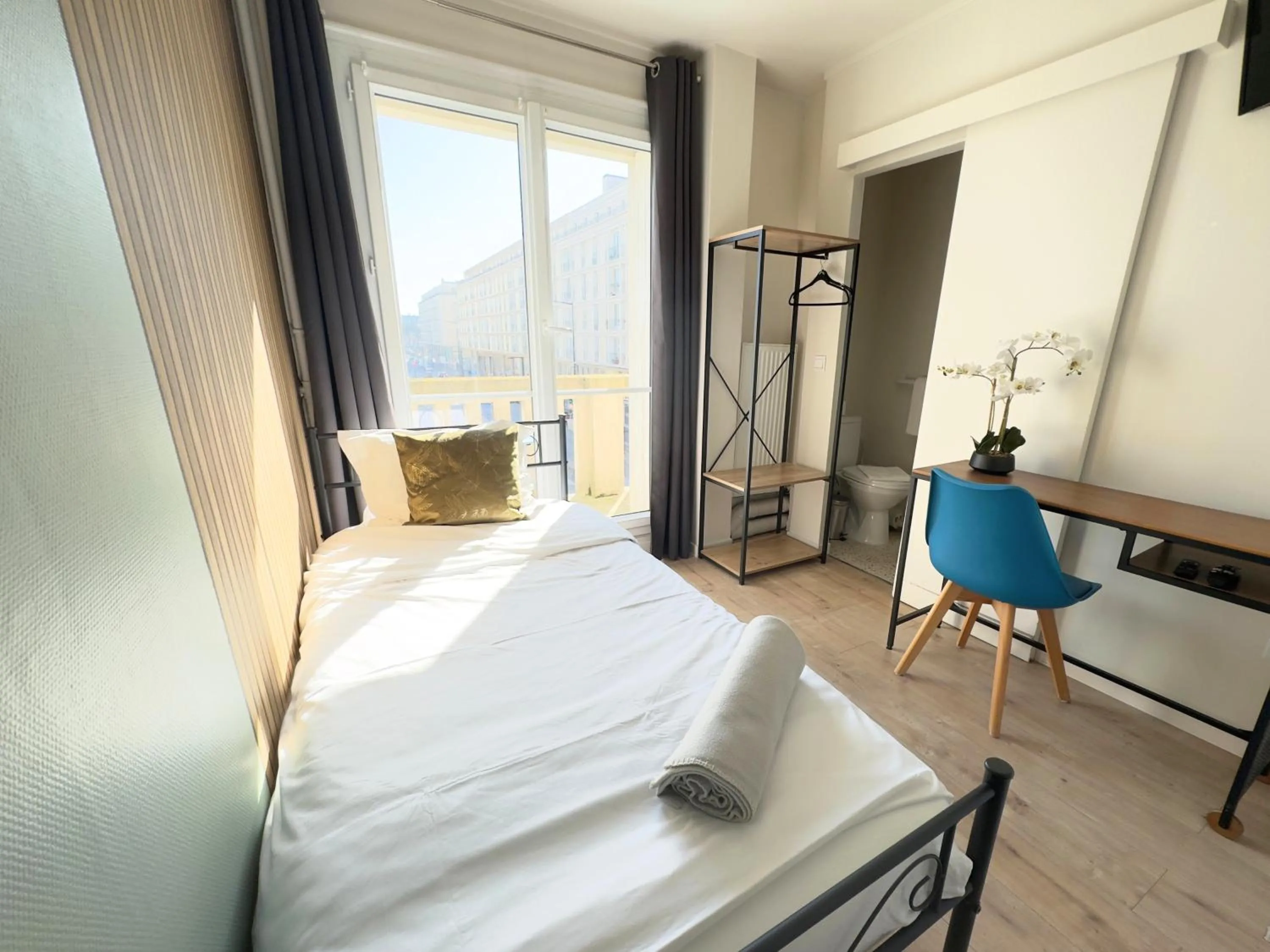 Bed in L'Escale Appartements et Suites en bord de Mer
