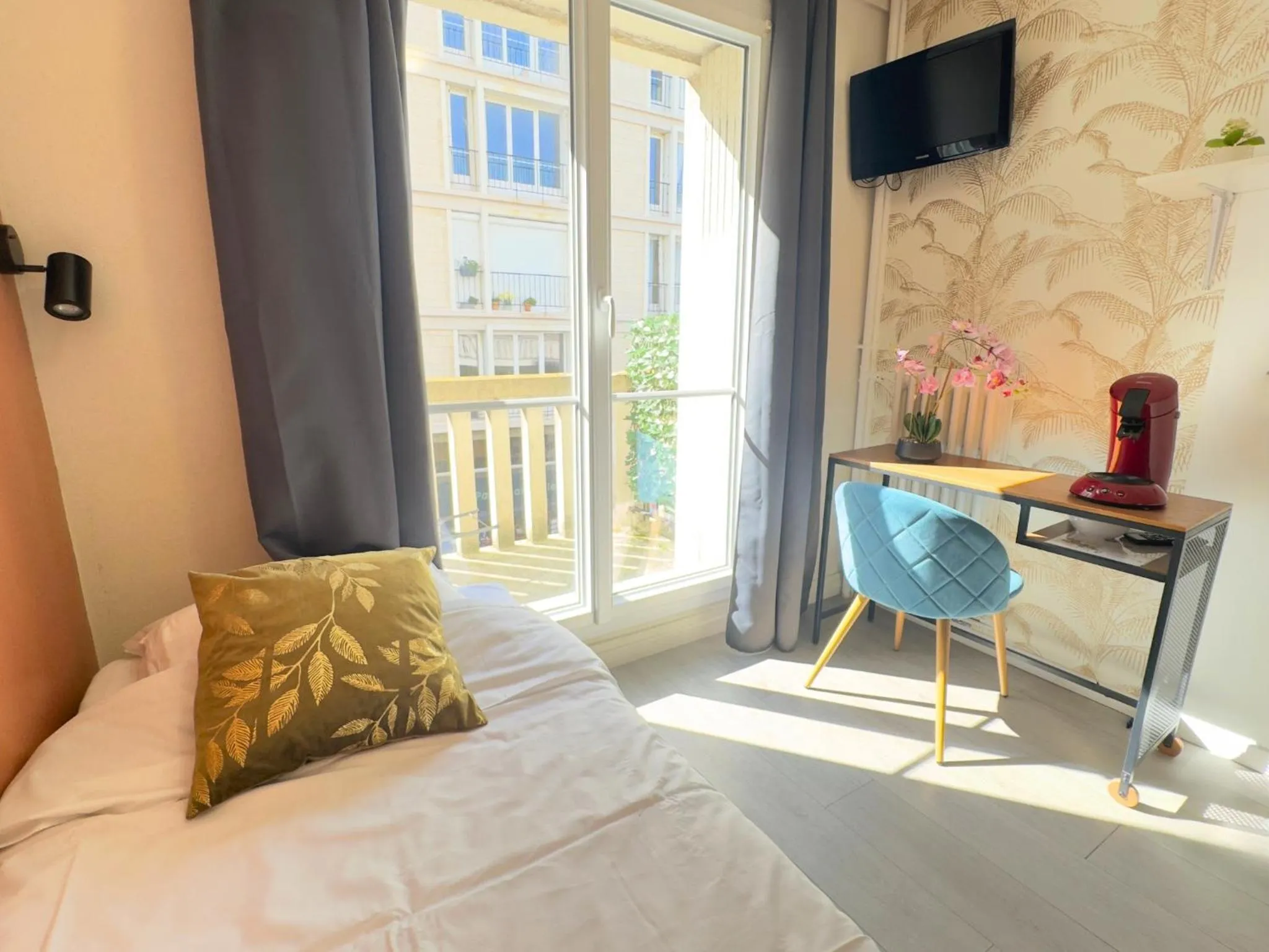 Bed in L'Escale Appartements et Suites en bord de Mer