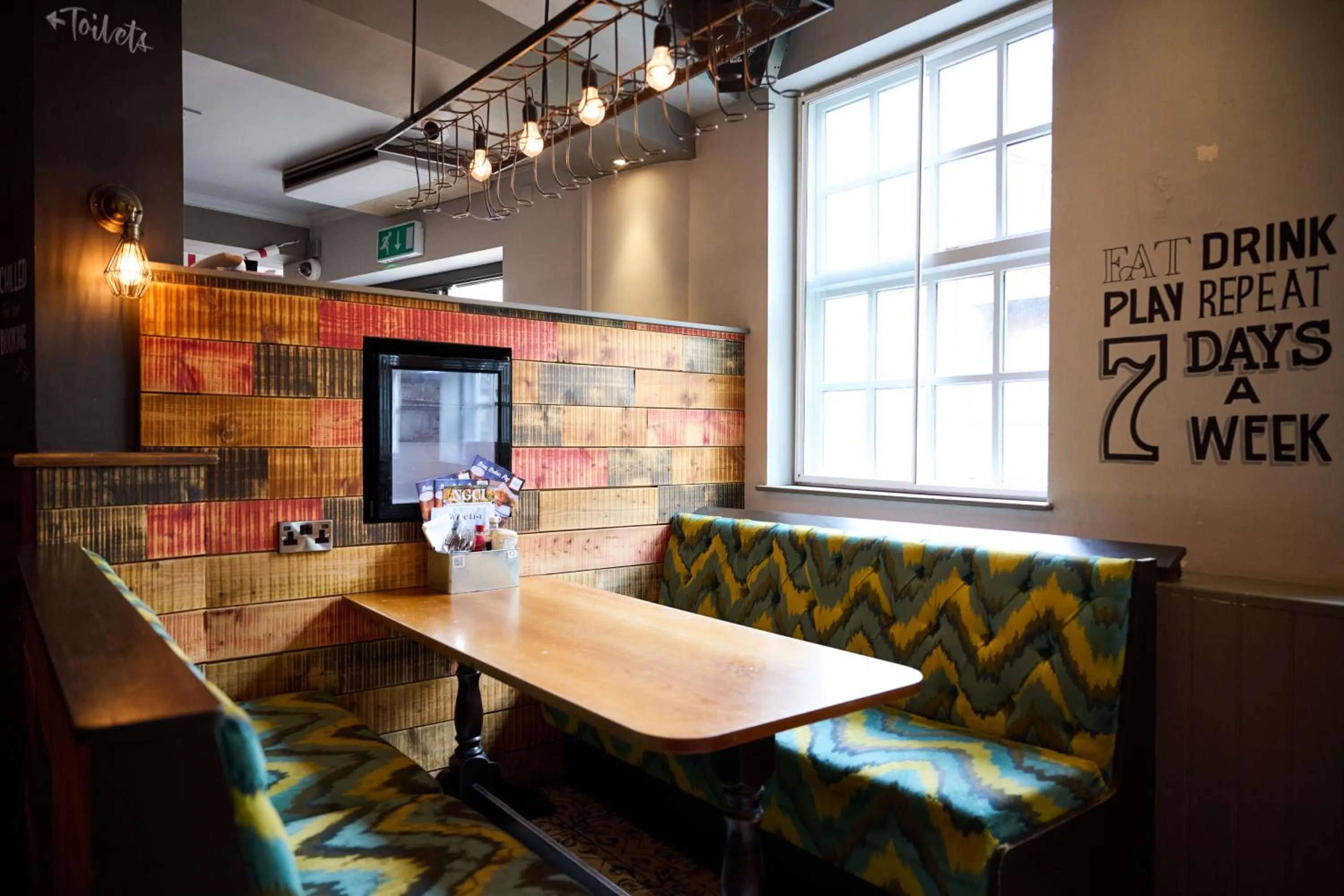 Dining area in White Hart, Newmarket by Marston's Inns