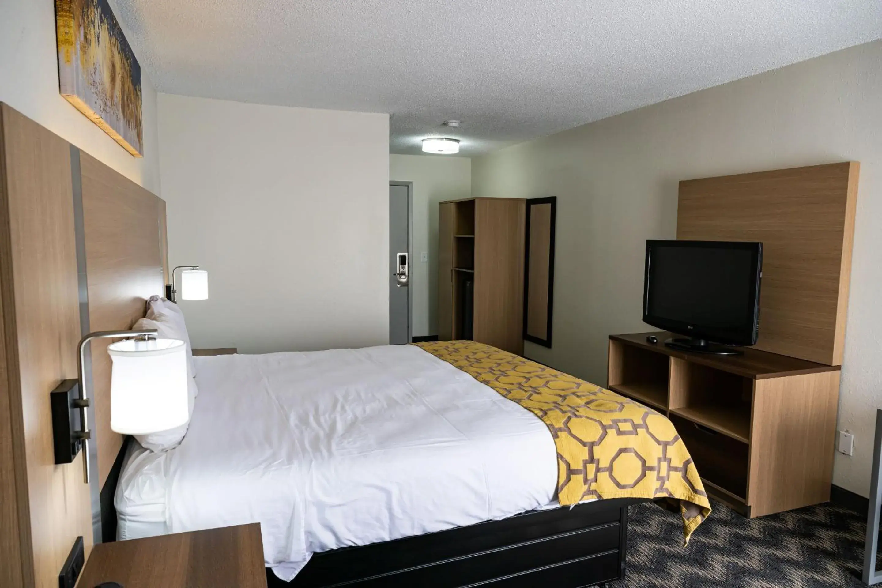 Bed in Baymont by Wyndham Greensboro/Coliseum Bed in Baymont by Wyndham Greensboro/Coliseum