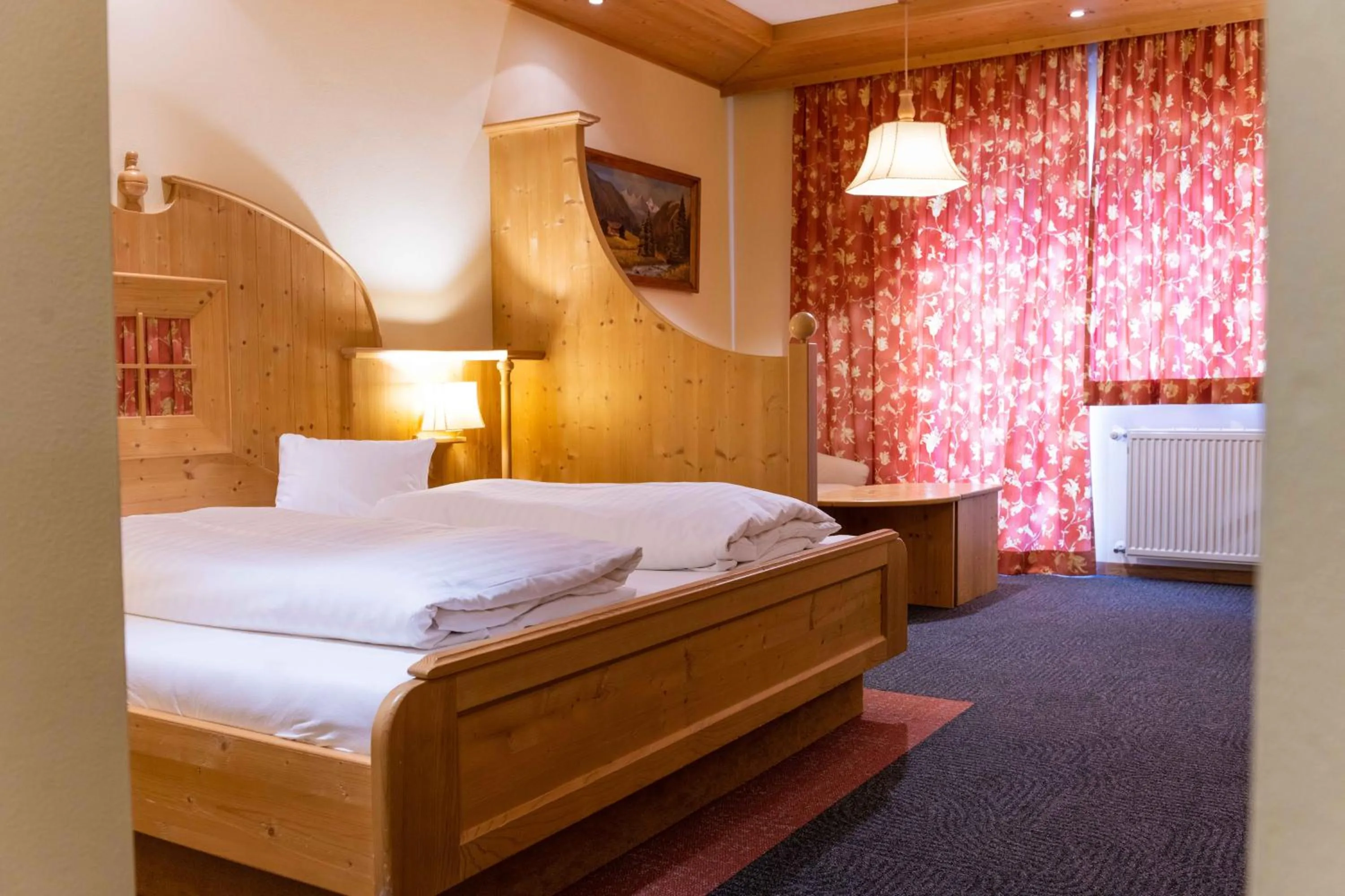 Photo of the whole room, Bed in Alpin Panoramahotel Lärchenhof