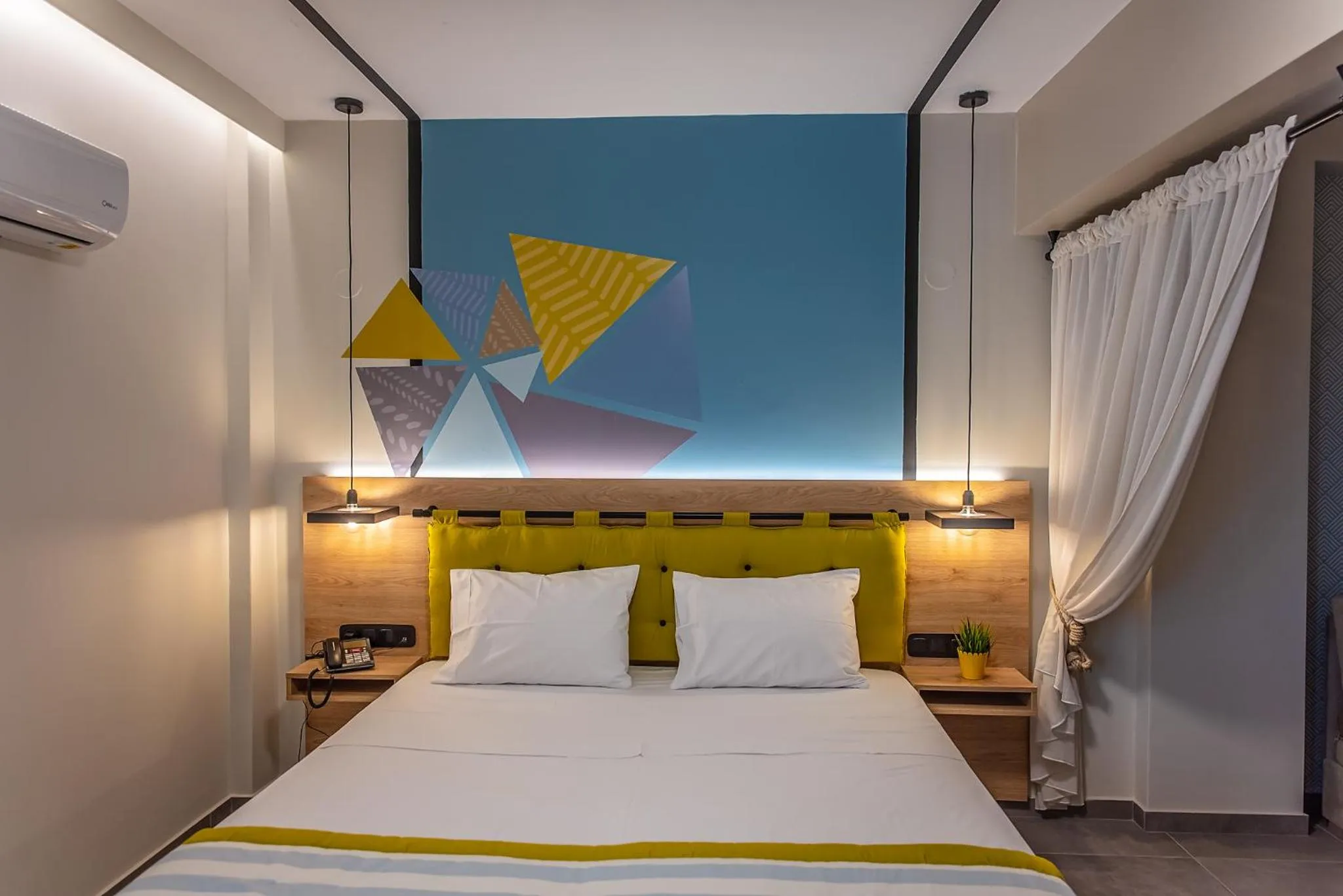 Bed in Mythic Summer Hotel