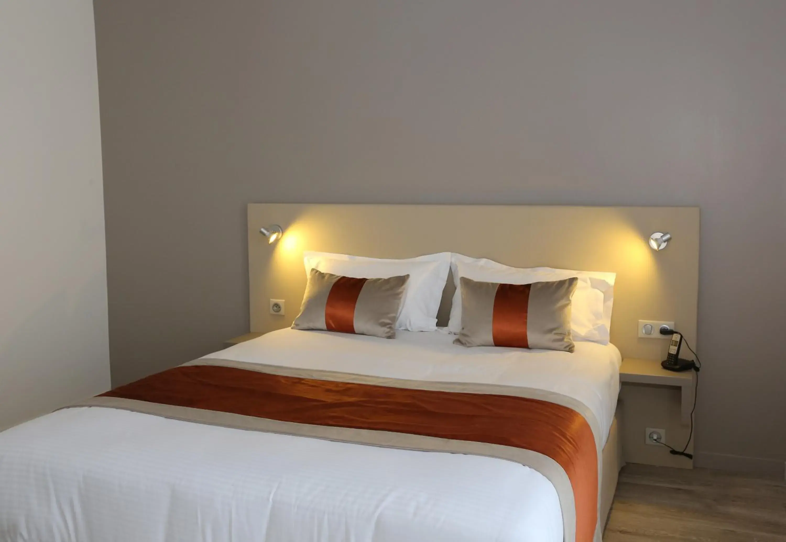 Bed in Les Criquets Hôtel & Spa Bed in Les Criquets Hôtel & Spa