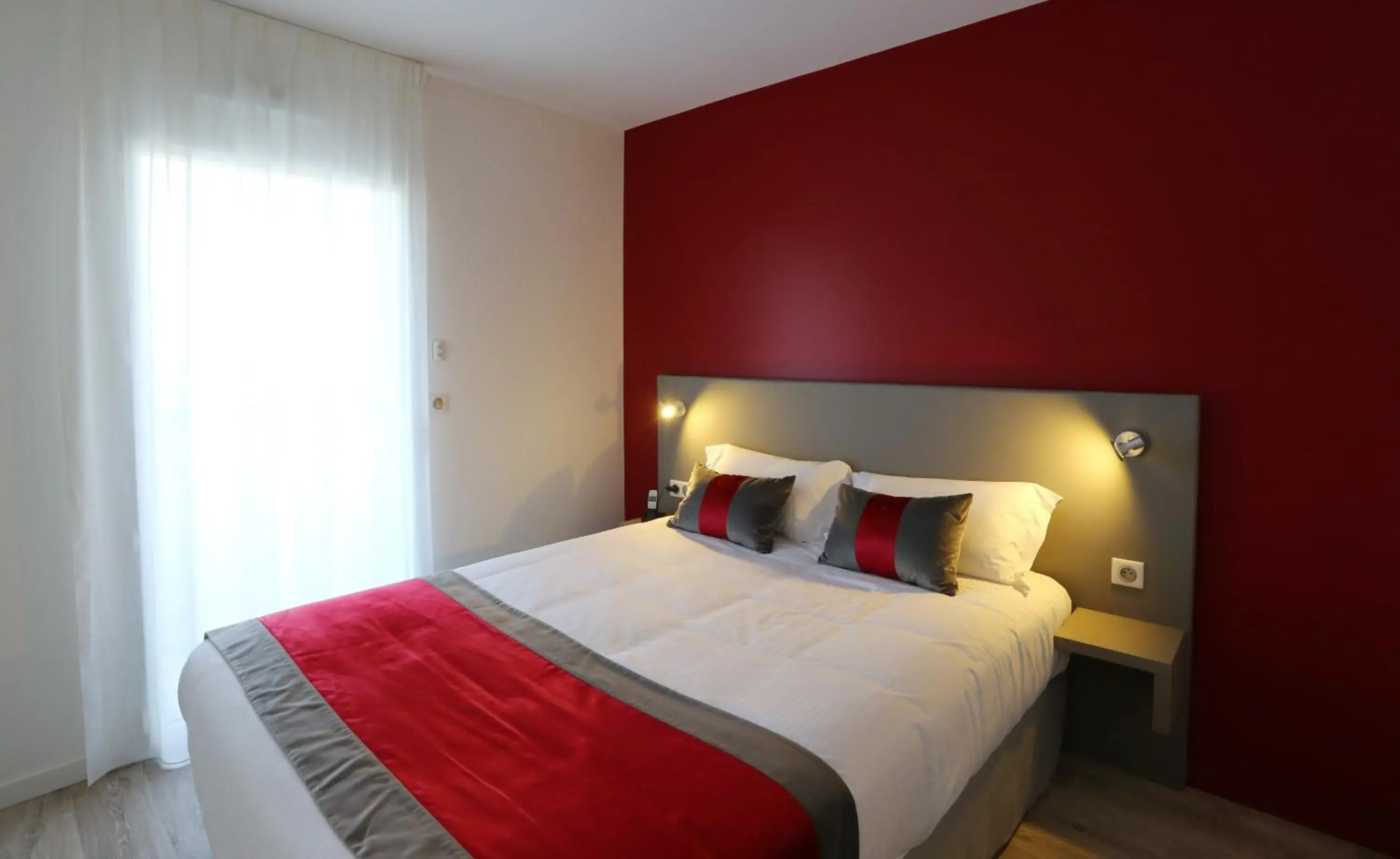 Bed in Les Criquets Hôtel & Spa Bed in Les Criquets Hôtel & Spa