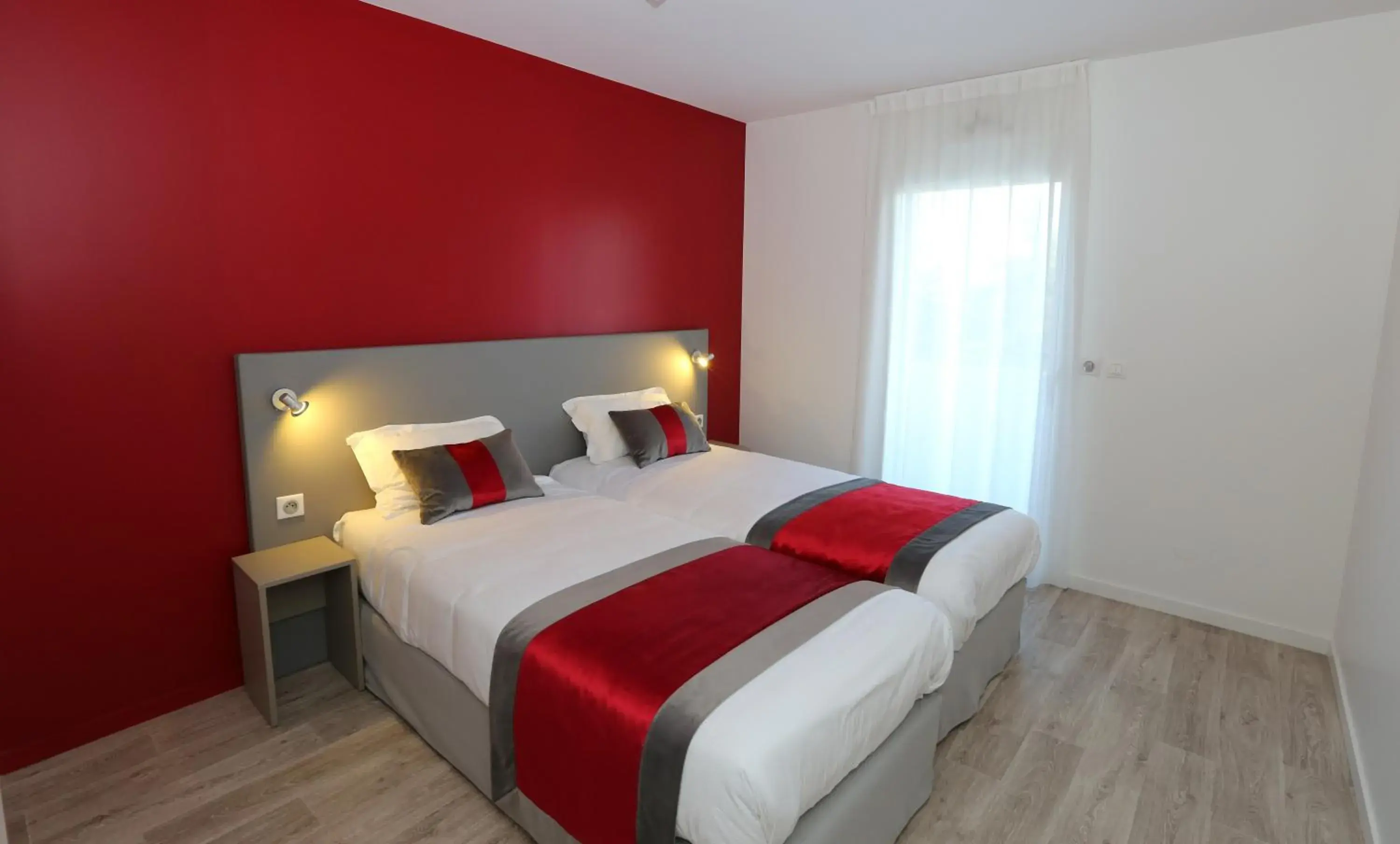 Bed in Les Criquets Hôtel & Spa Bed in Les Criquets Hôtel & Spa