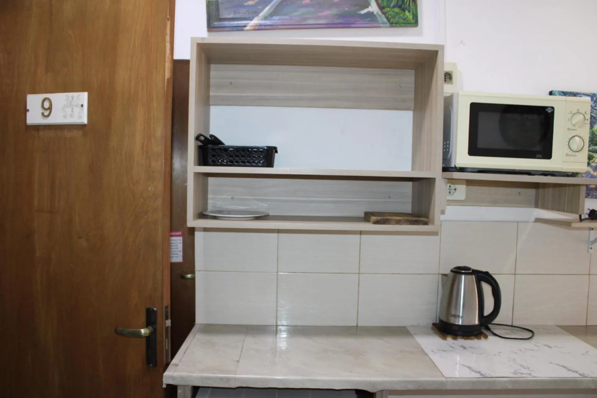 Kitchen or kitchenette in Aparthotel Maison Suisse