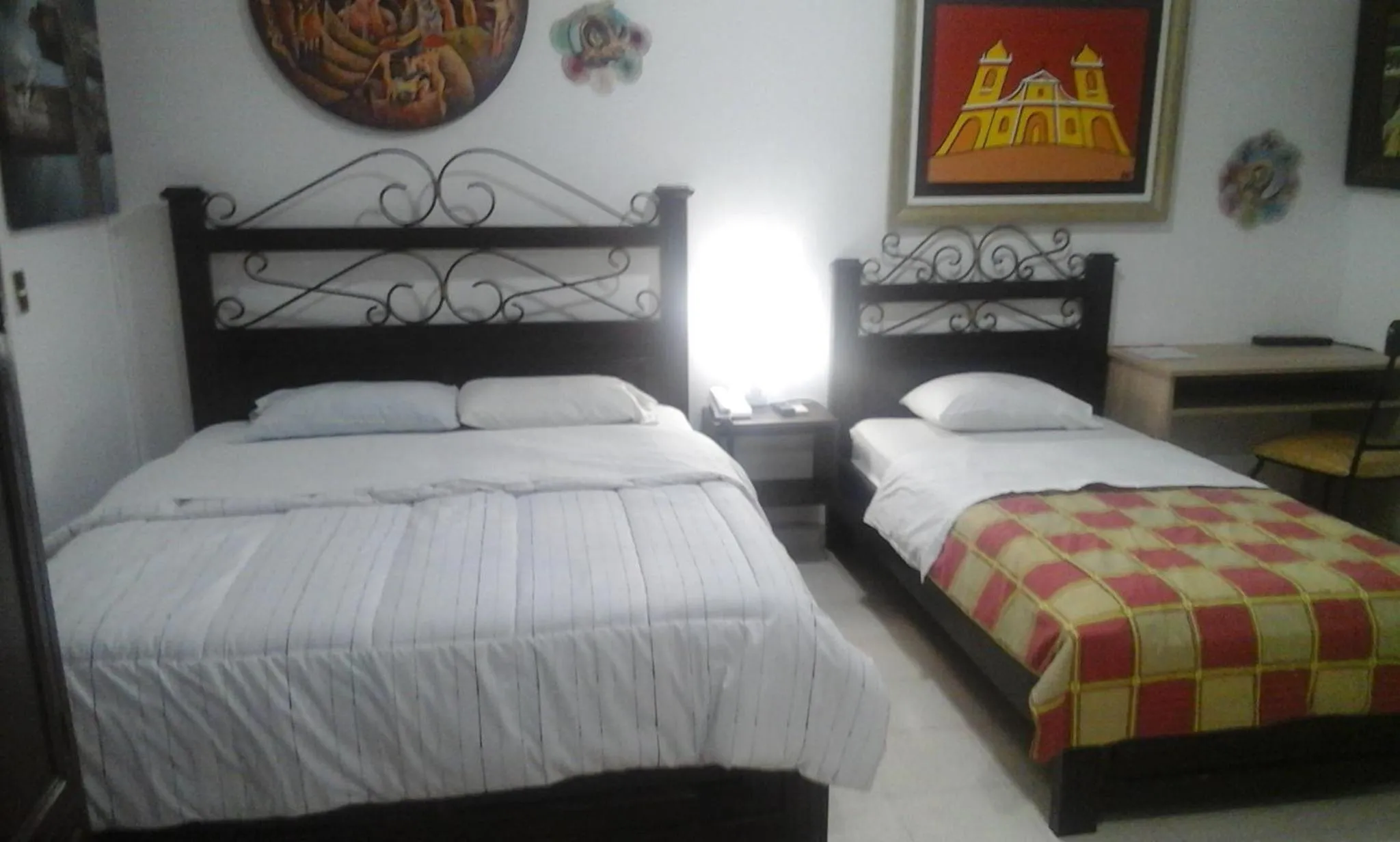 Bed in ApartHotel Maison Suisse