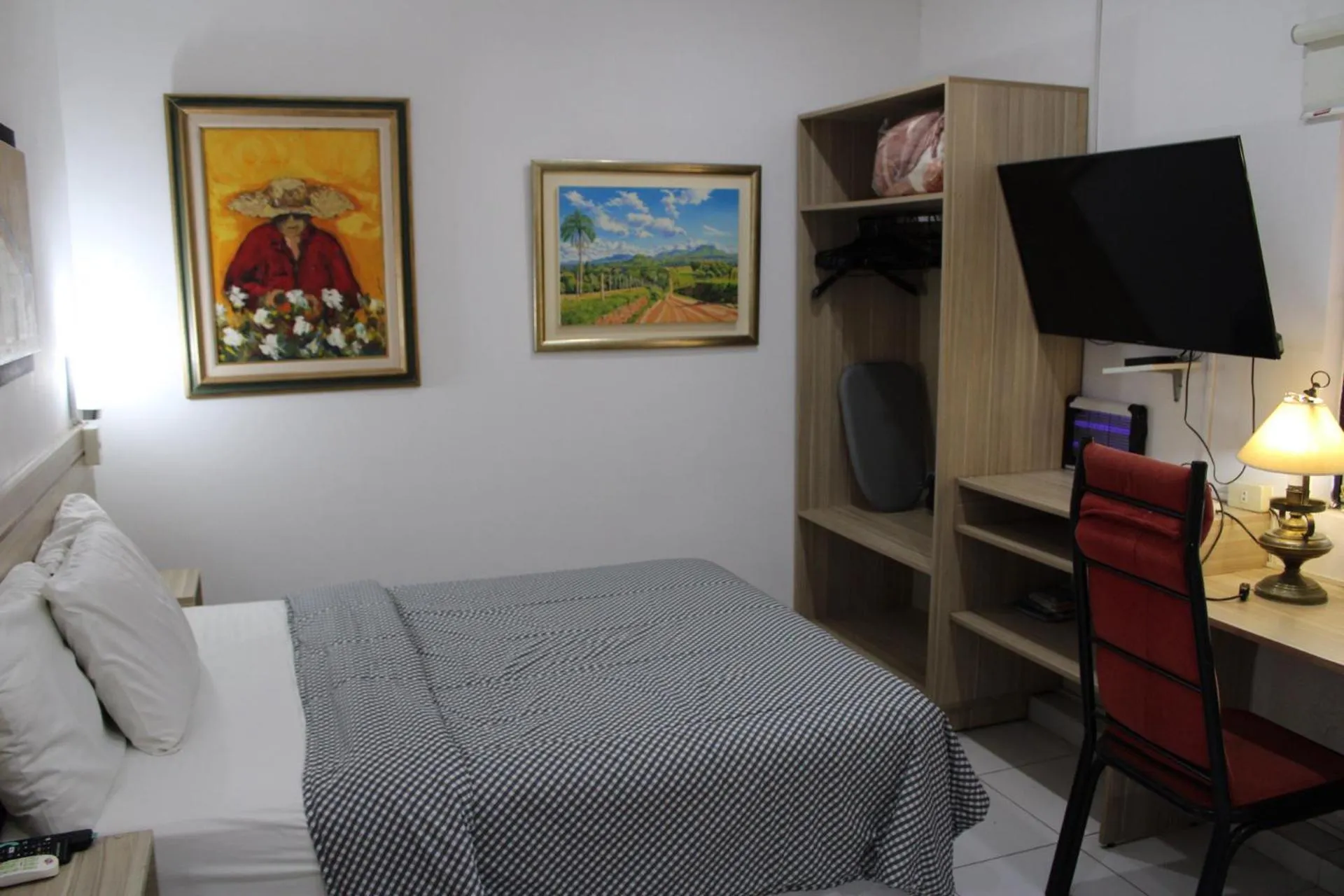 Communal lounge/ TV room, Bed in Aparthotel Maison Suisse