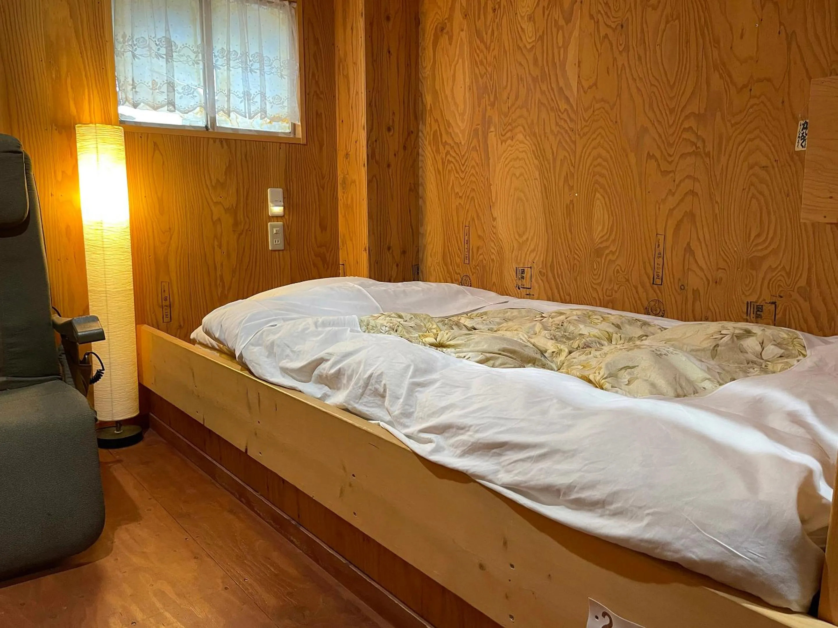 Bedroom, Bed in Guesthouse Otaru Wanokaze