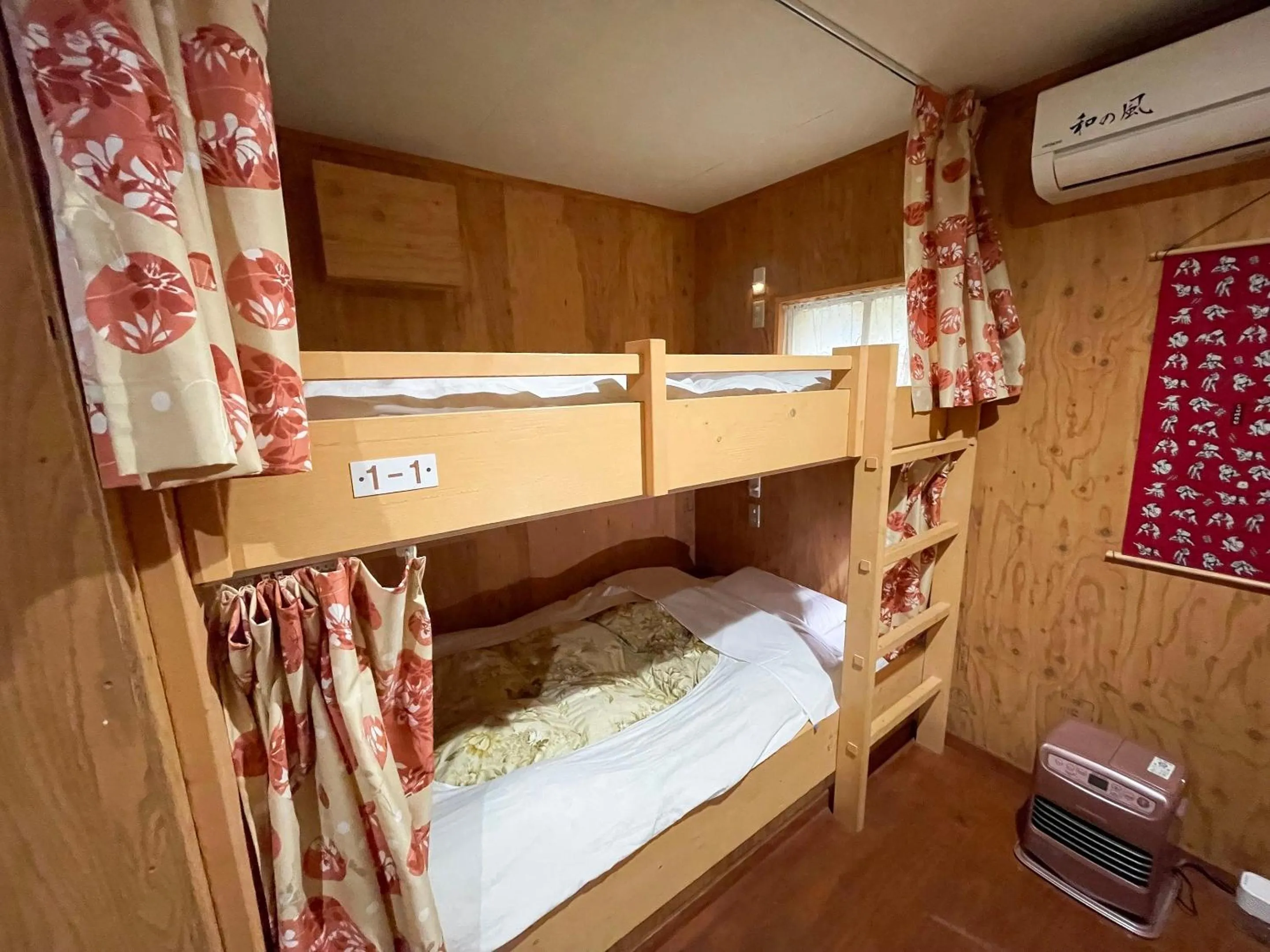 Bedroom, Bed in Guesthouse Otaru Wanokaze