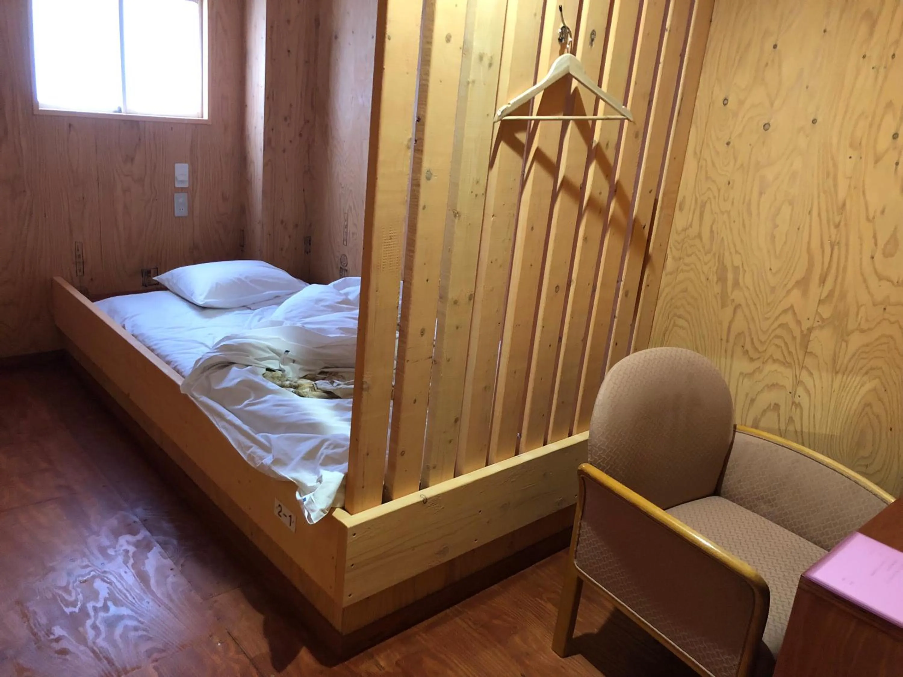 Bed in Guesthouse Otaru Wanokaze