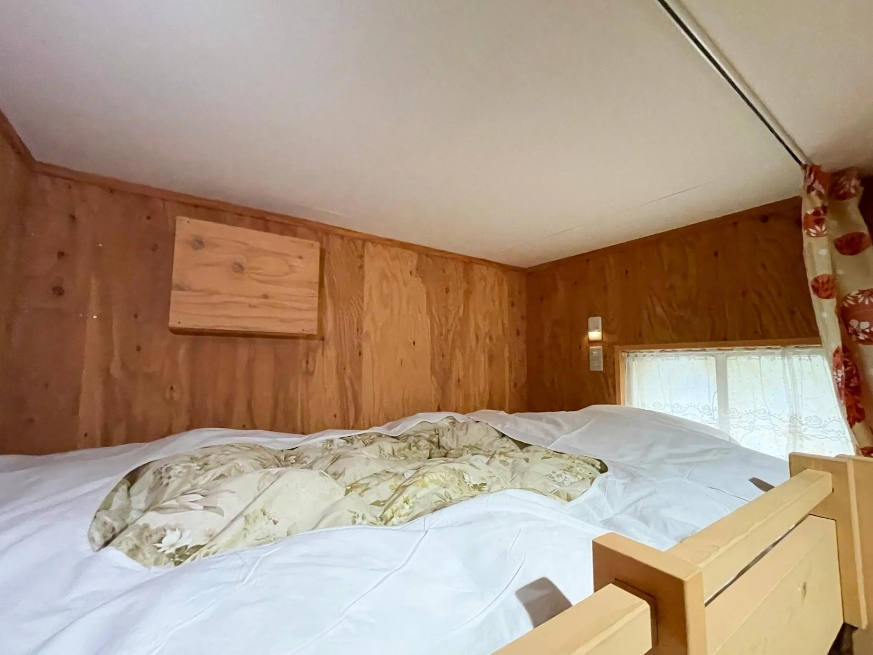 Bedroom, Bed in Guesthouse Otaru Wanokaze