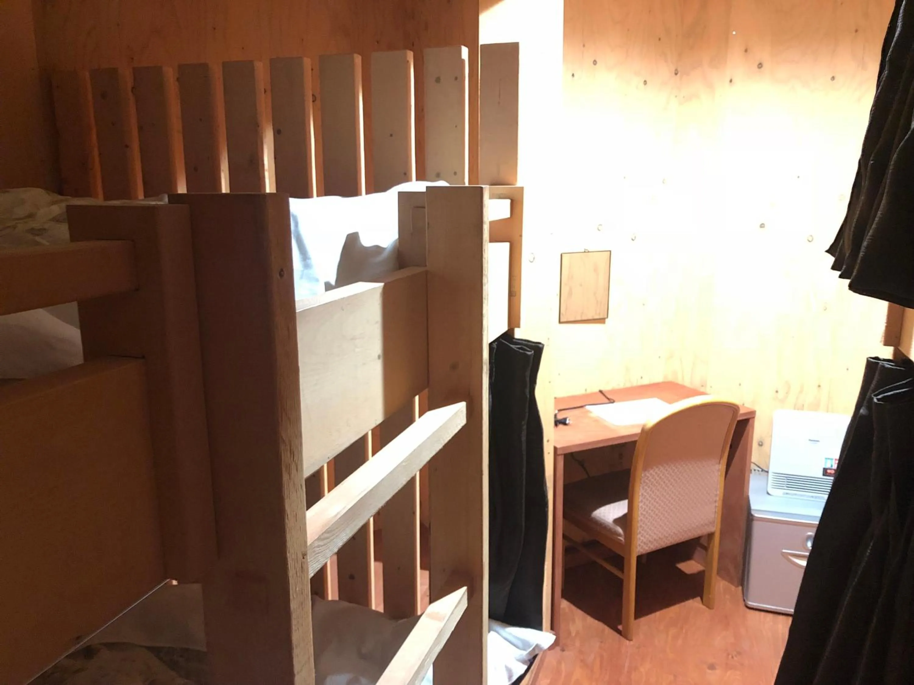 Bed in Guesthouse Otaru Wanokaze