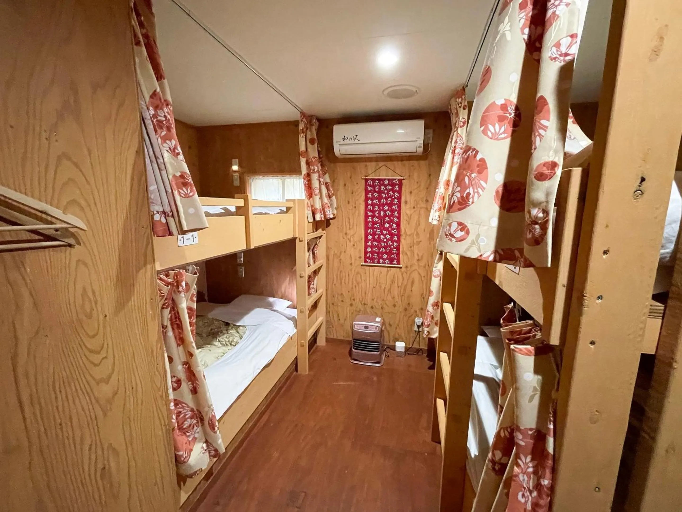 Bedroom, Bed in Guesthouse Otaru Wanokaze