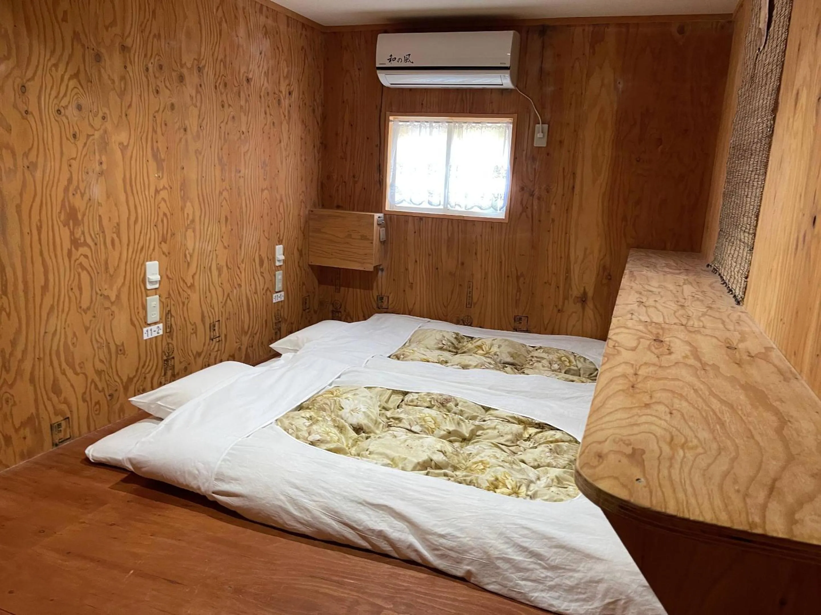 Photo of the whole room, Bed in Guesthouse Otaru Wanokaze