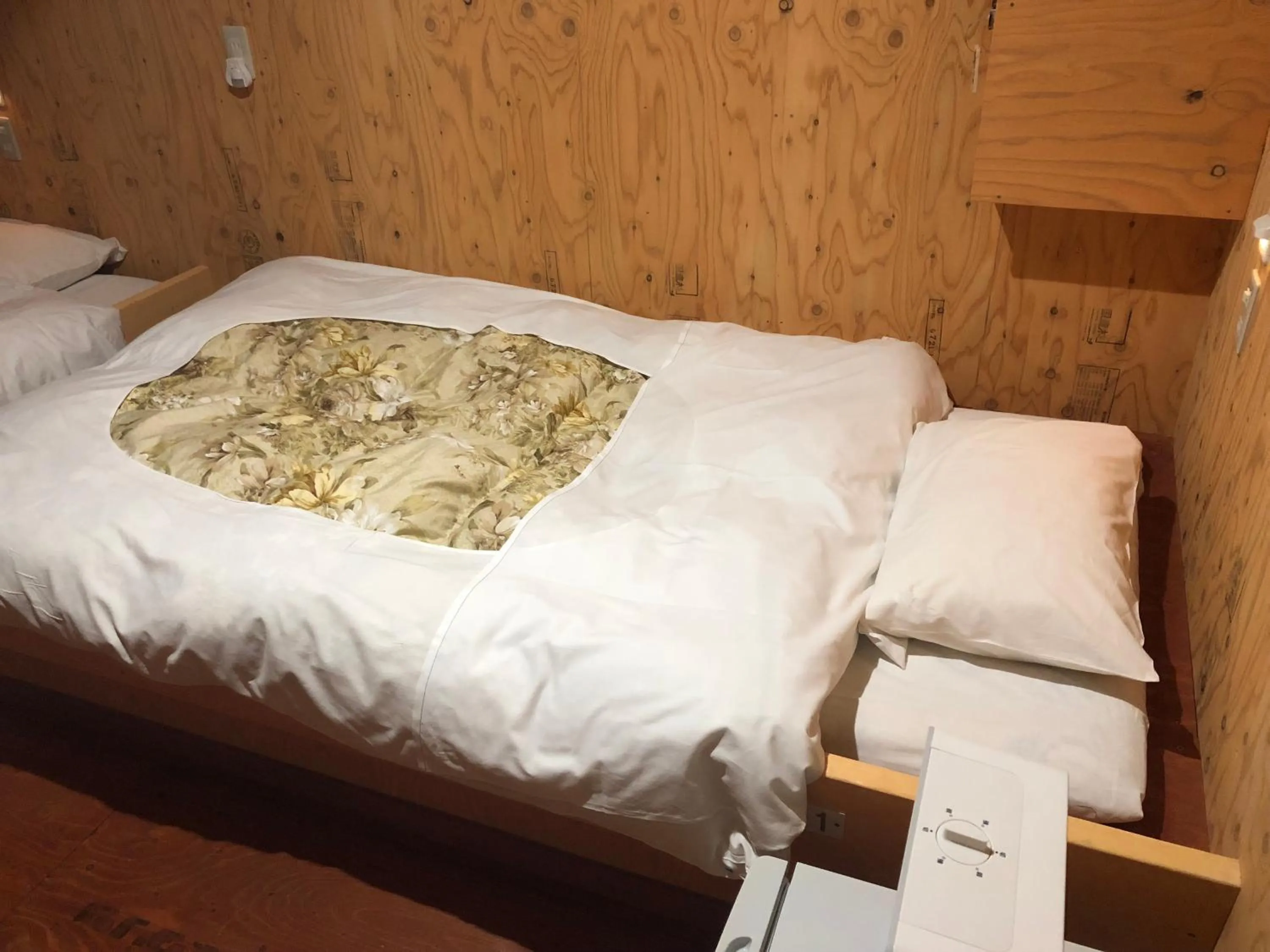 Bed in Guesthouse Otaru Wanokaze