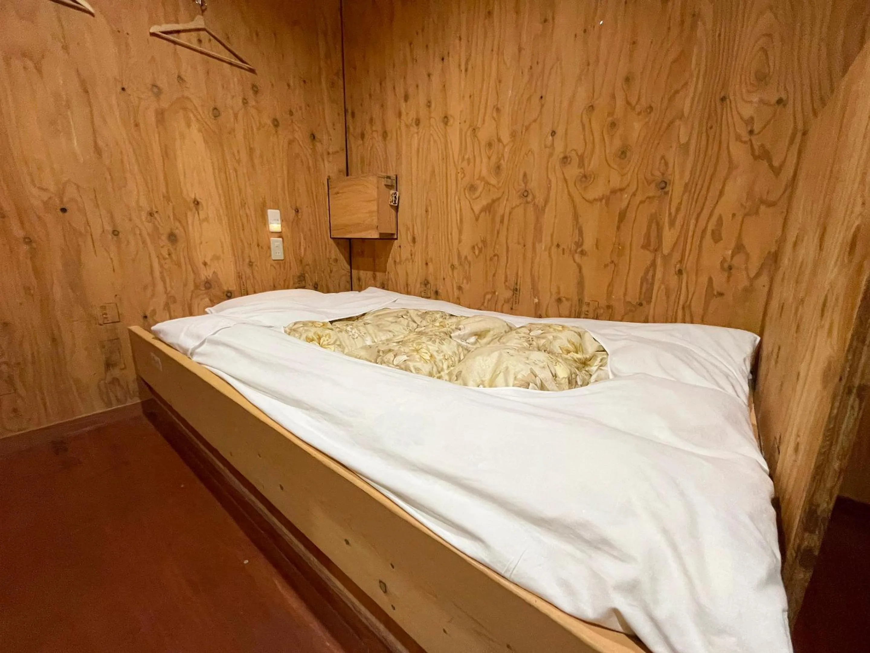 Bedroom, Bed in Guesthouse Otaru Wanokaze