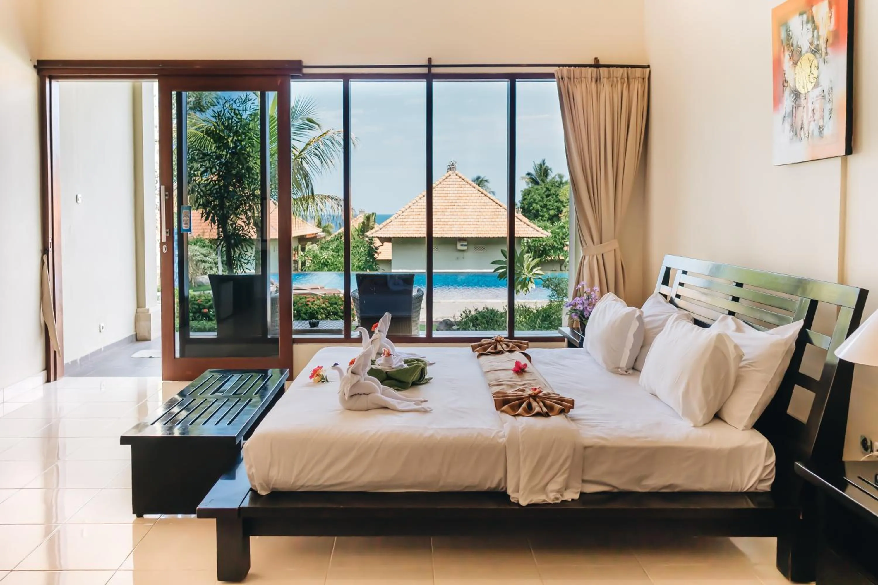 Balcony/Terrace, Bed in Ocean View Tulamben Dive & Resort