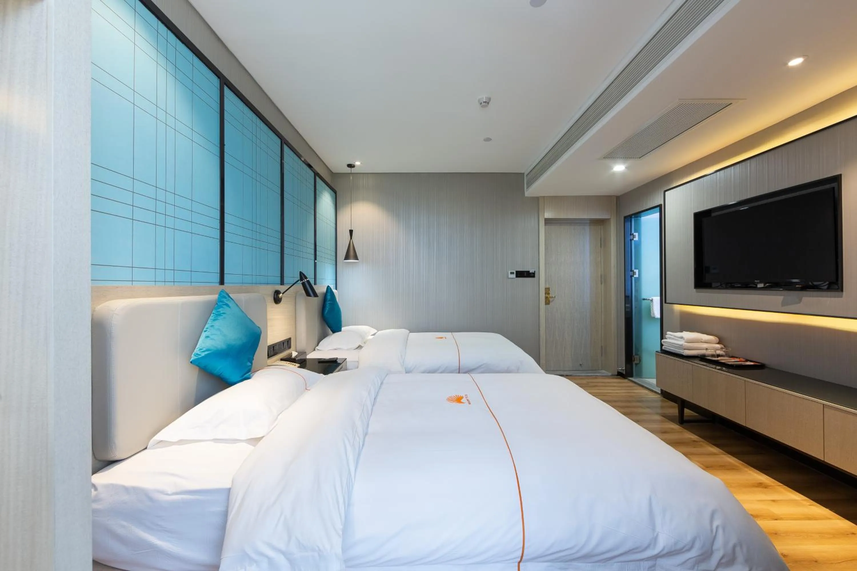 Bed in 朗逸商务酒店 Warm Yes Hotel-广交会期间提供免费穿梭巴士