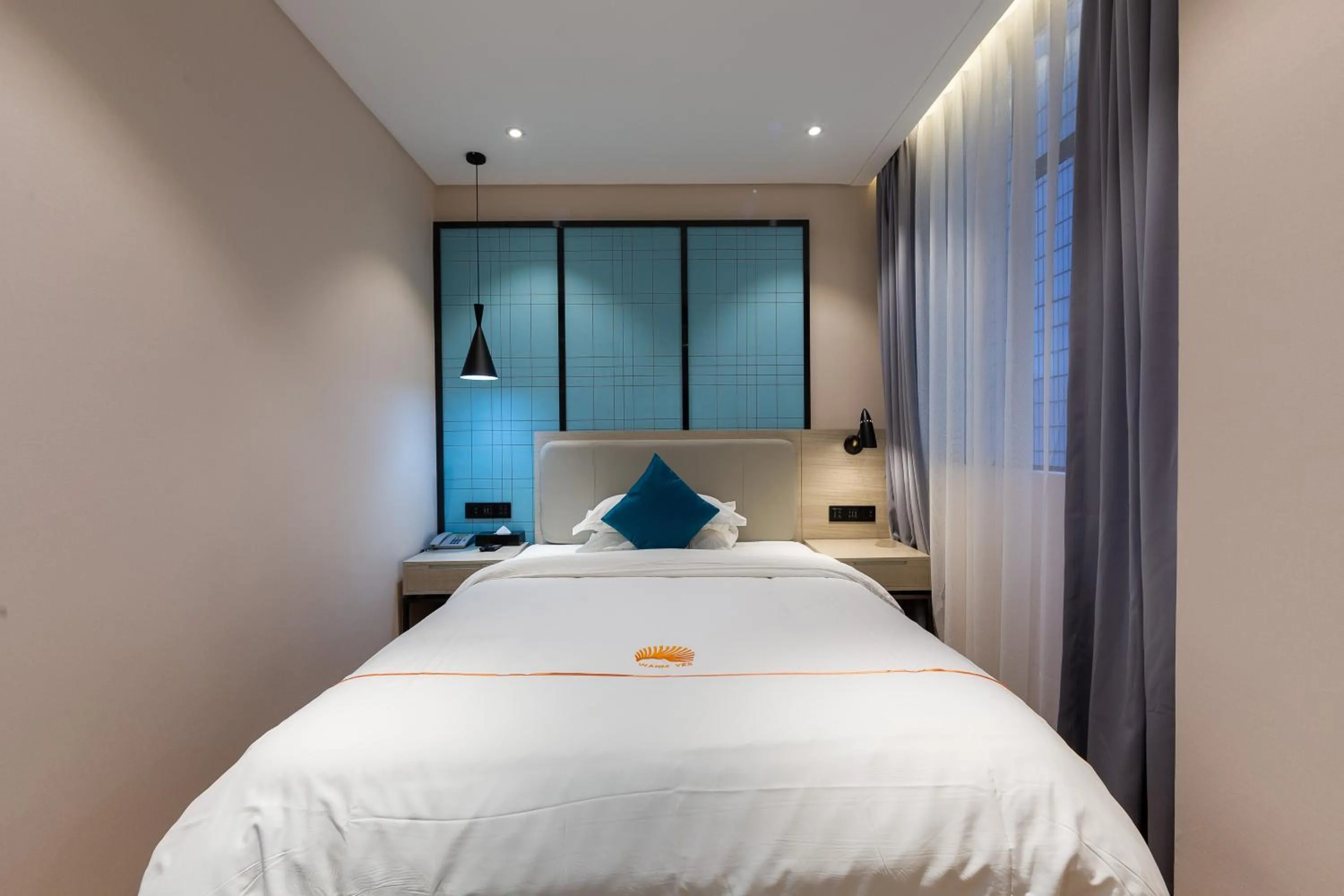 Bed in 朗逸商务酒店 Warm Yes Hotel-广交会期间提供免费穿梭巴士