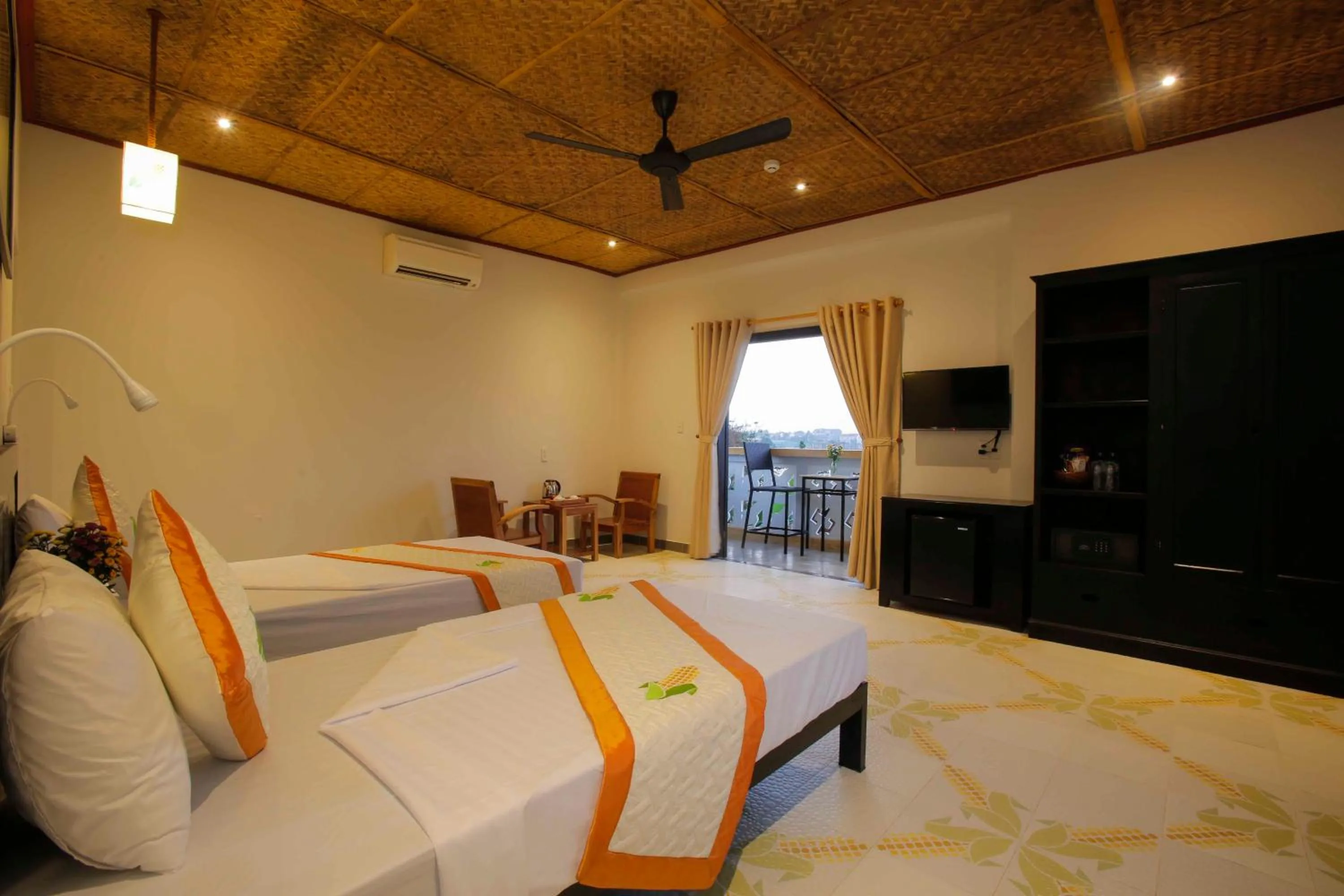 Bed in Hoi An Corn Riverside Villa