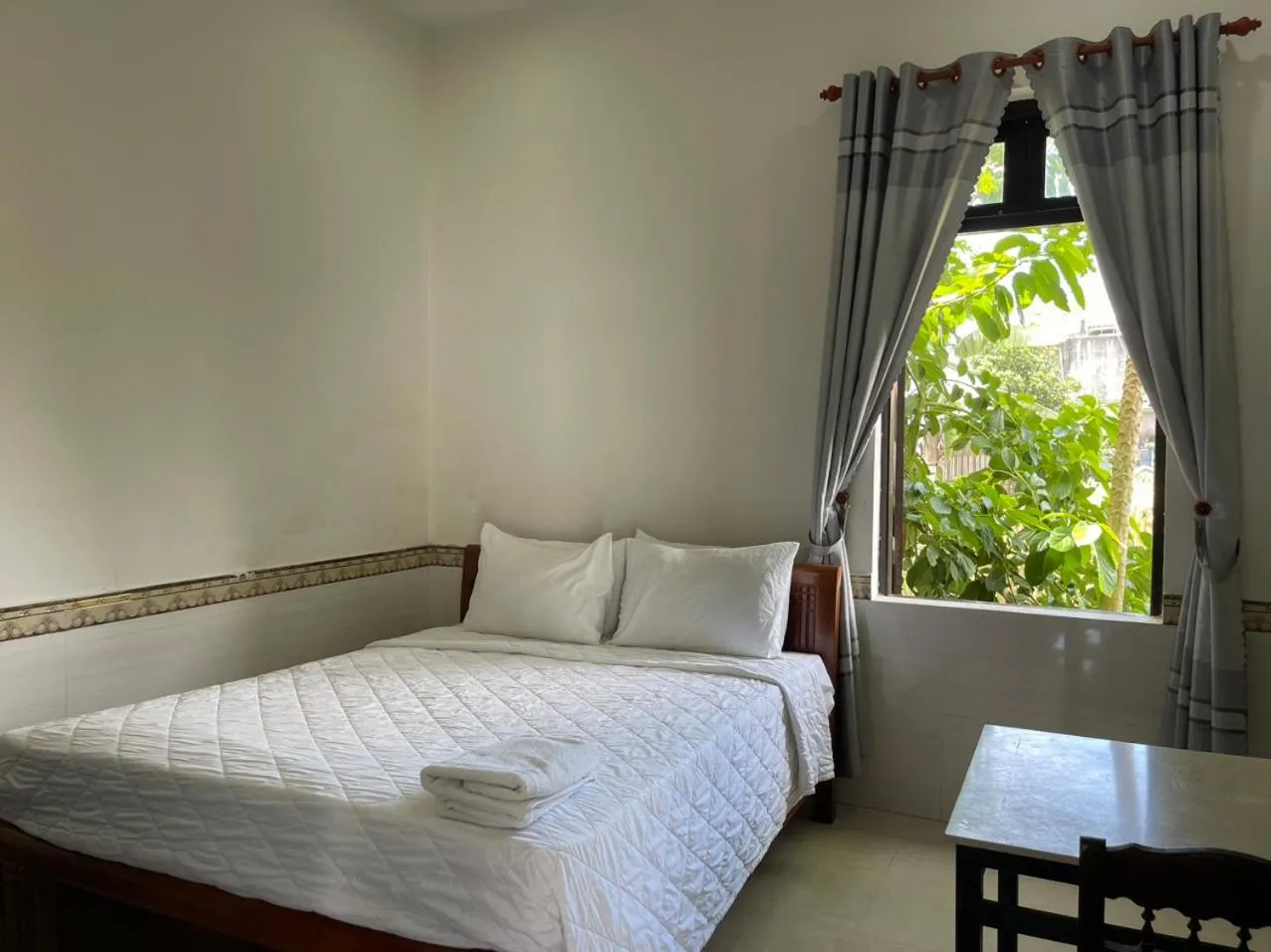 Bed in Hoi An Corn Riverside Villa