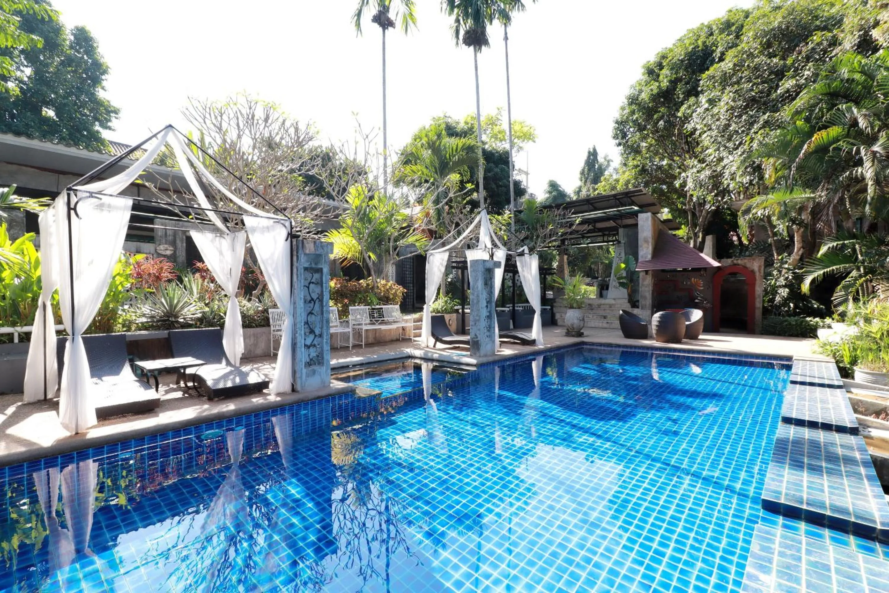 Swimming pool in Capital O 464 At Nata Chiangmai Chic Jungle