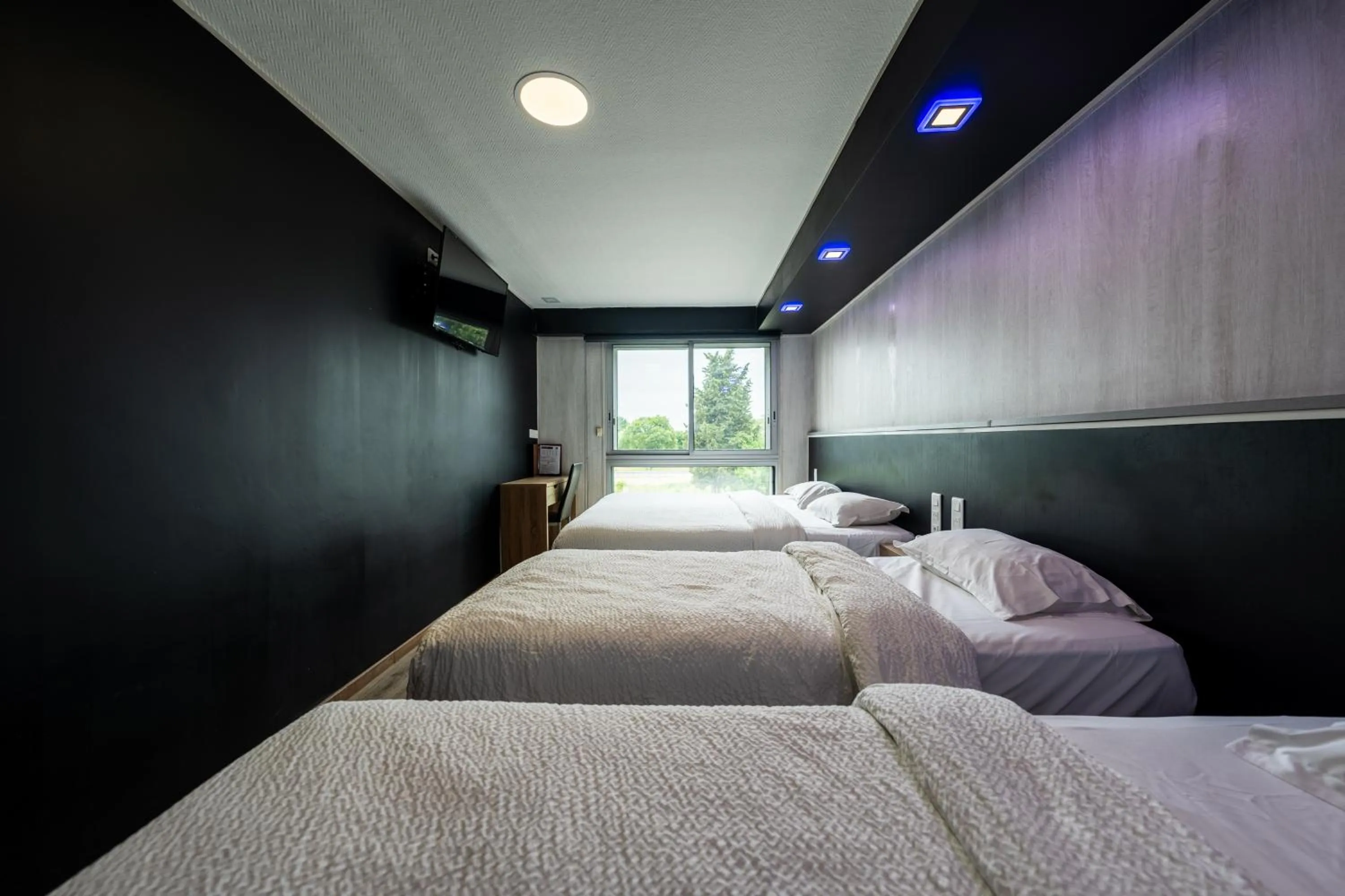 Bed in Hôtel La Rocade