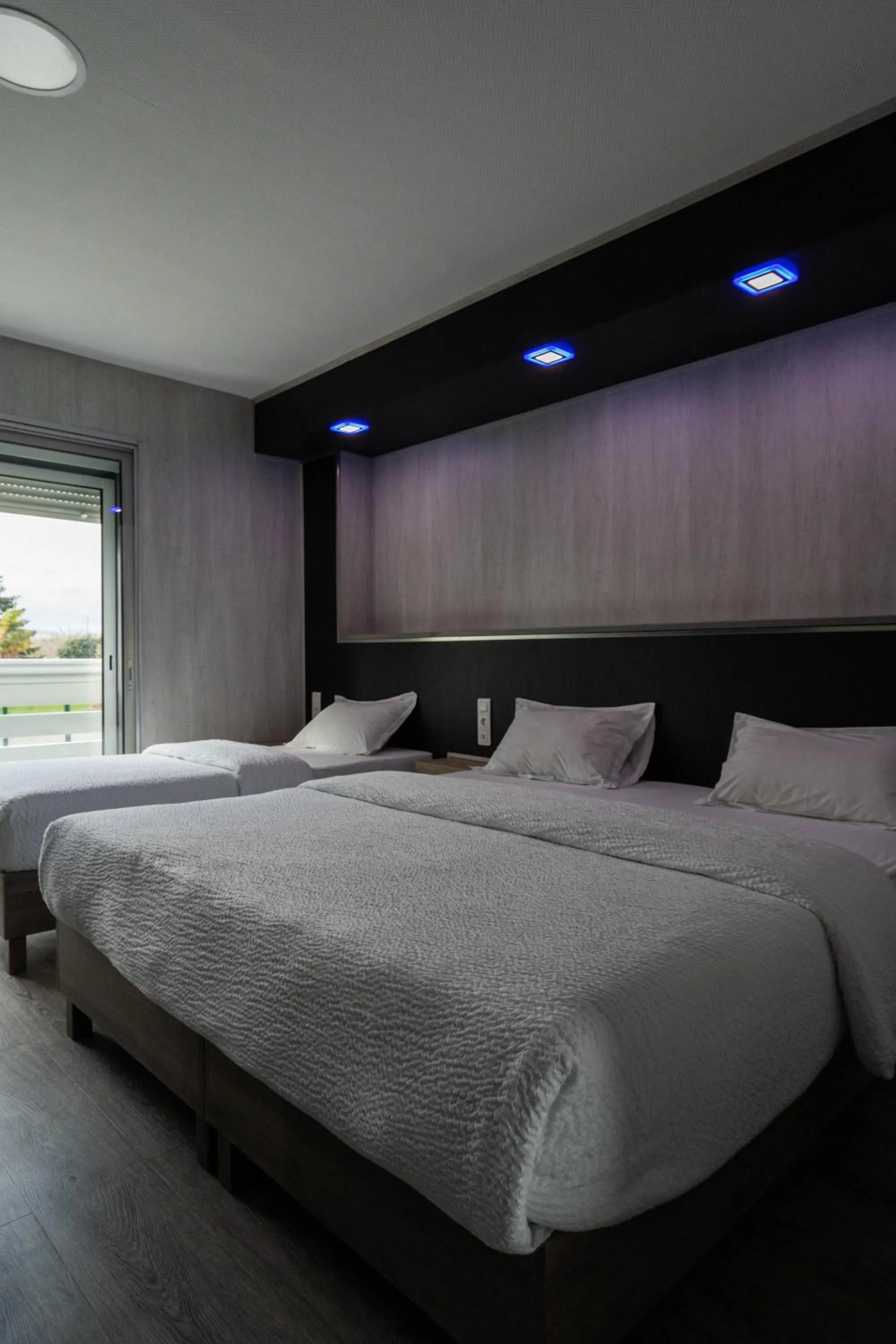 Bed in Hôtel La Rocade