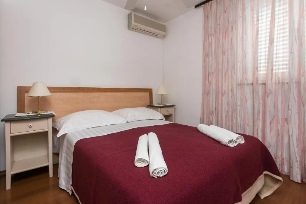 Bed in Kusalo Guesthouse