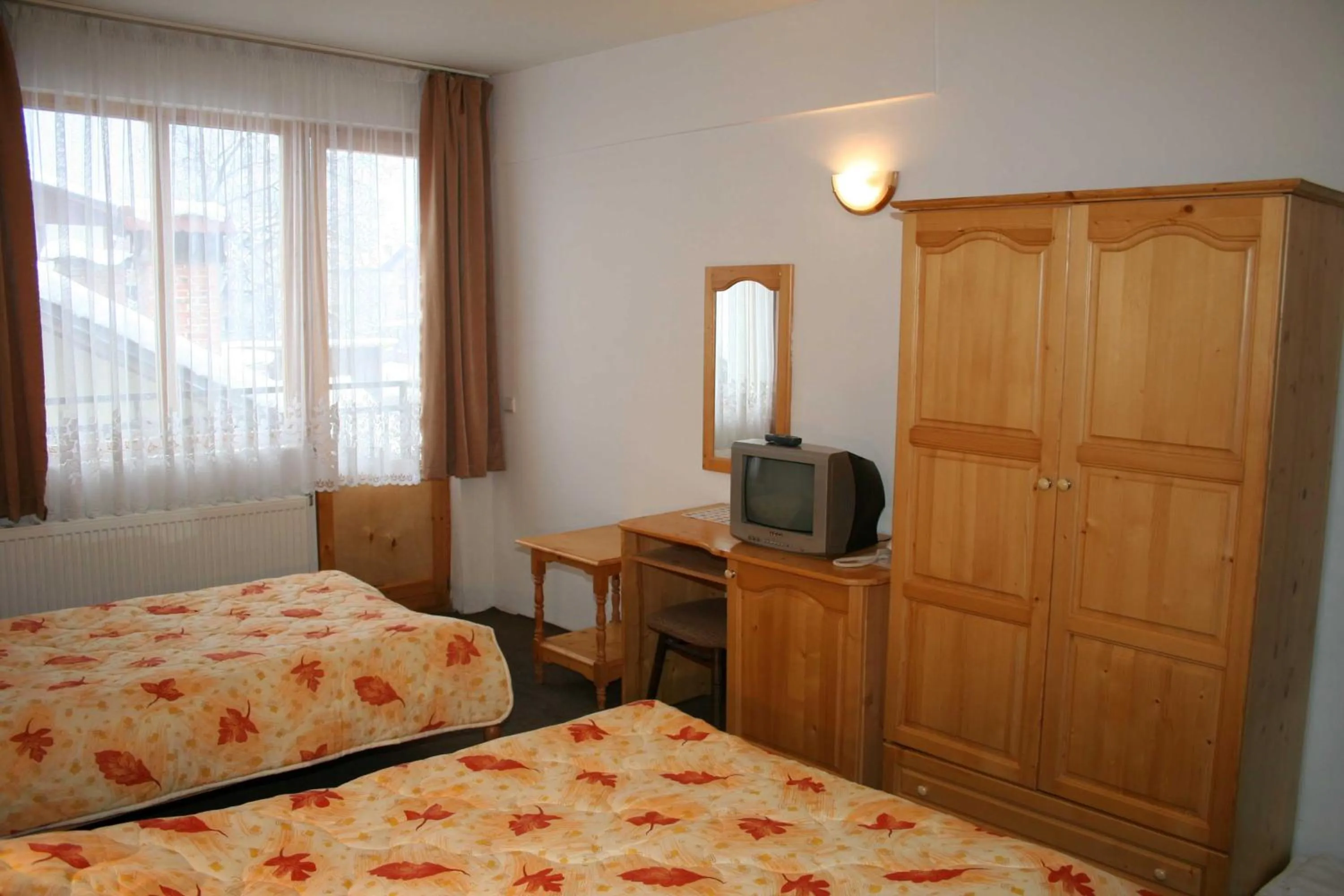 Bed in Family Hotel Bisser