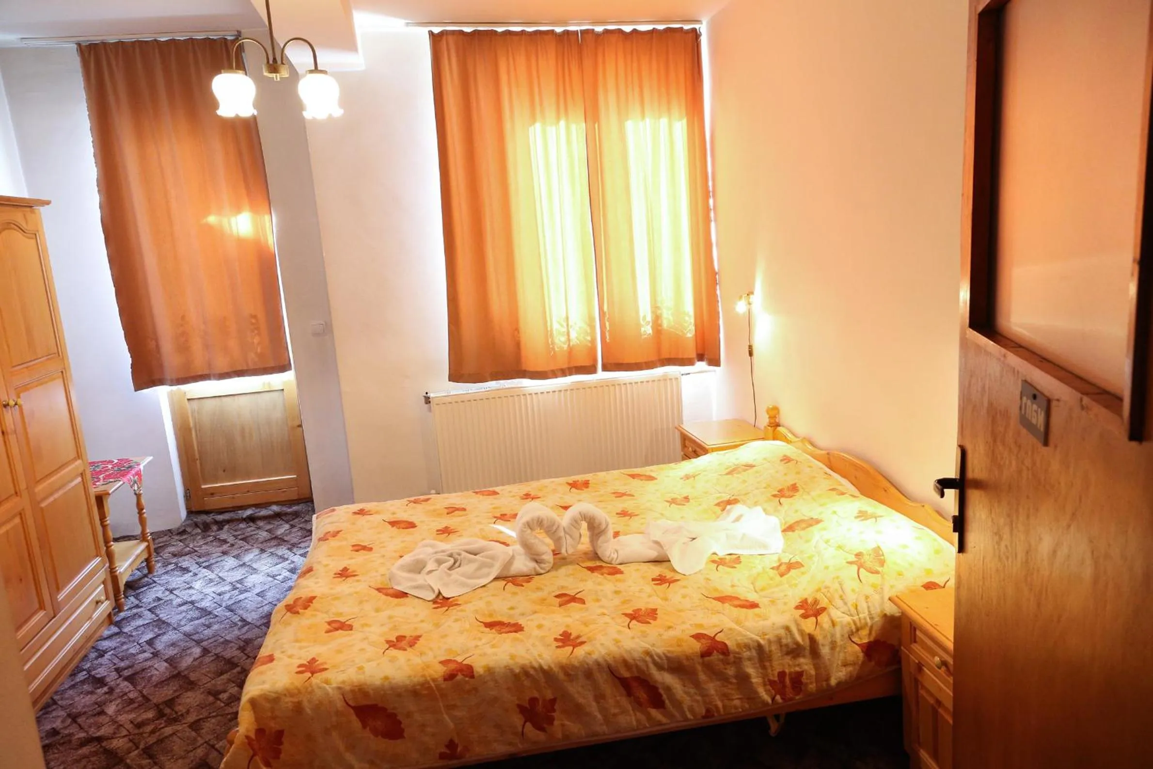 Bed in Family Hotel Bisser