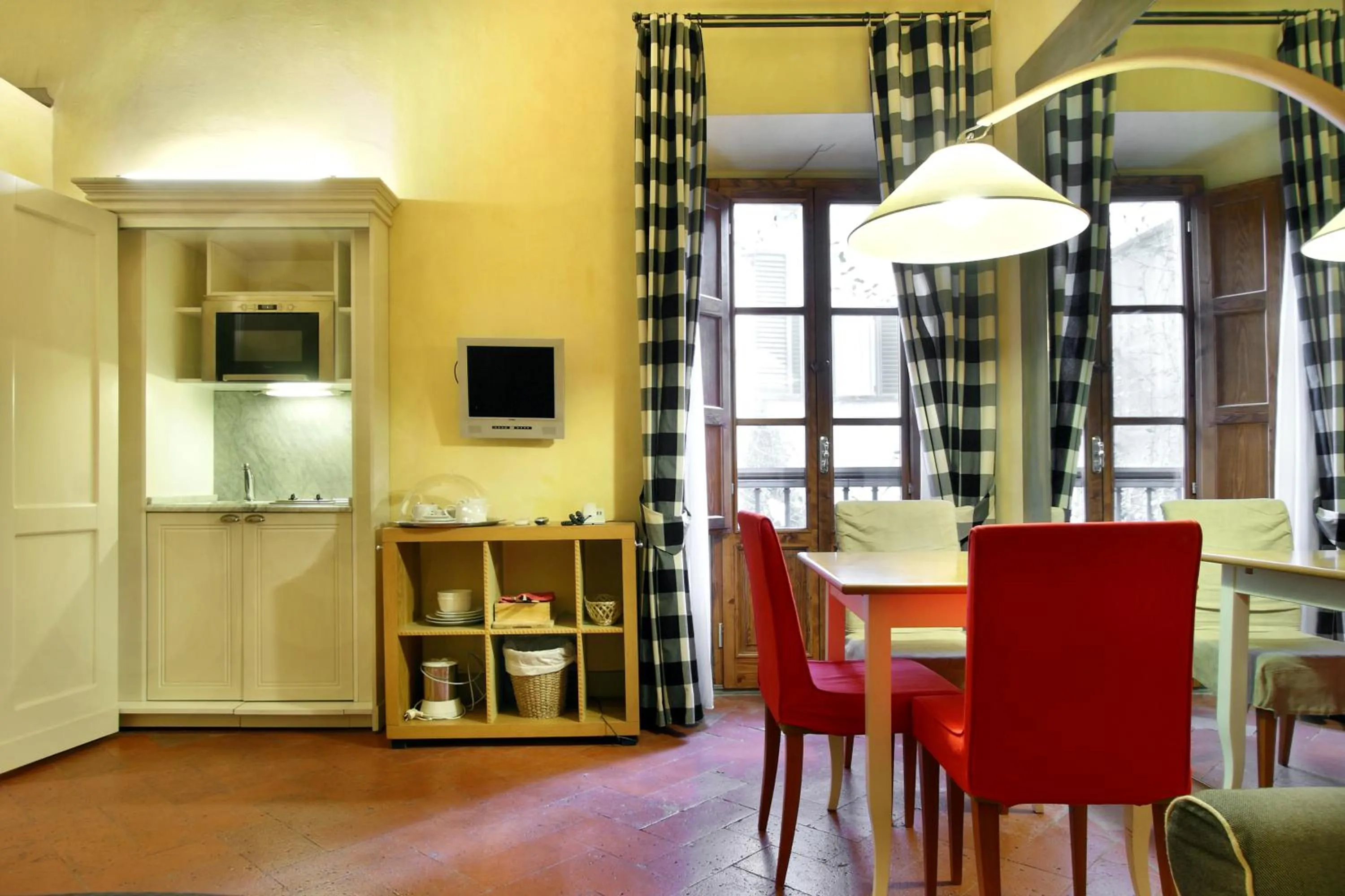 Kitchen or kitchenette in Piccolo Residence Apart-Hotel