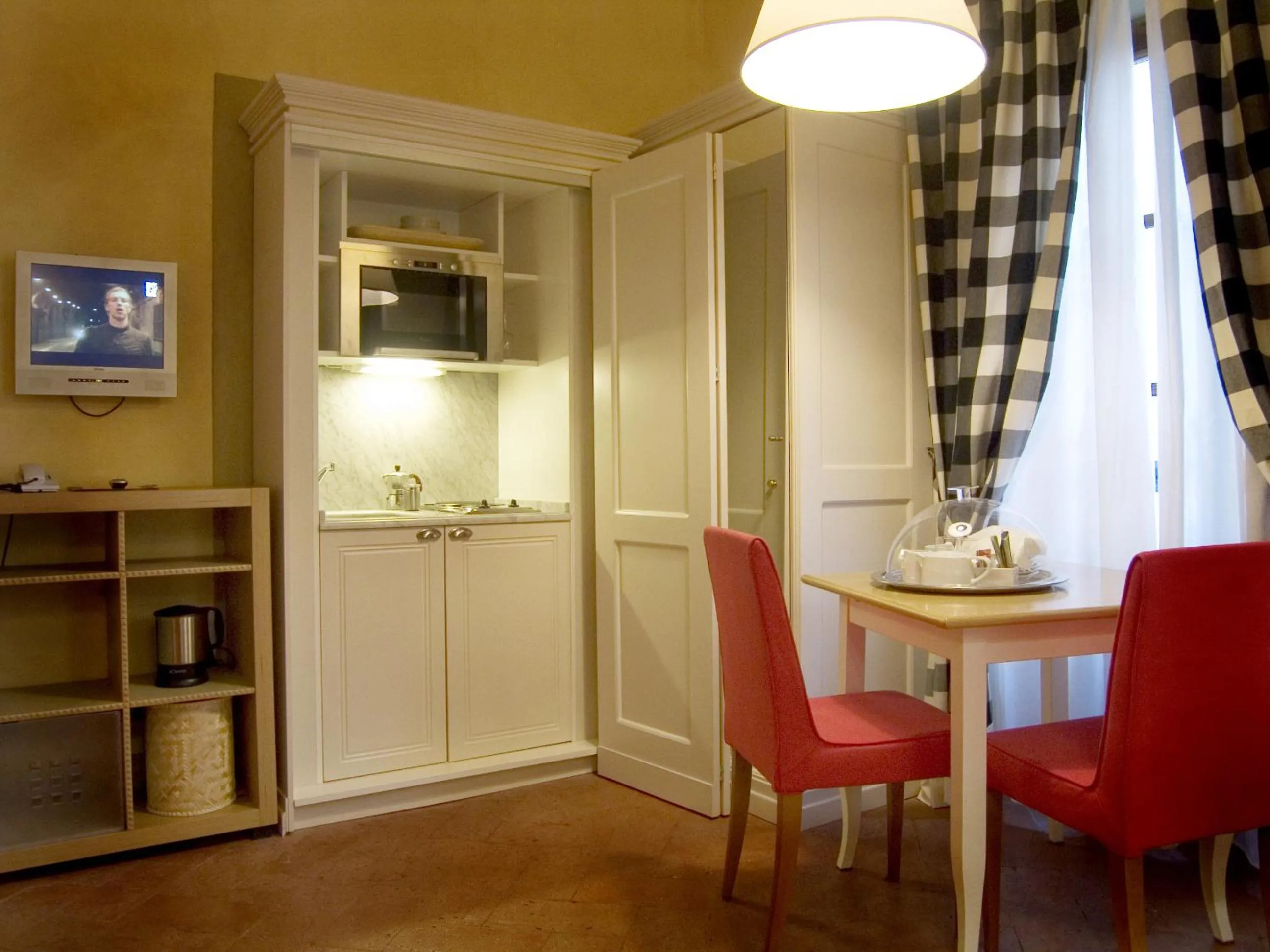 Kitchen or kitchenette in Piccolo Residence Apart-Hotel