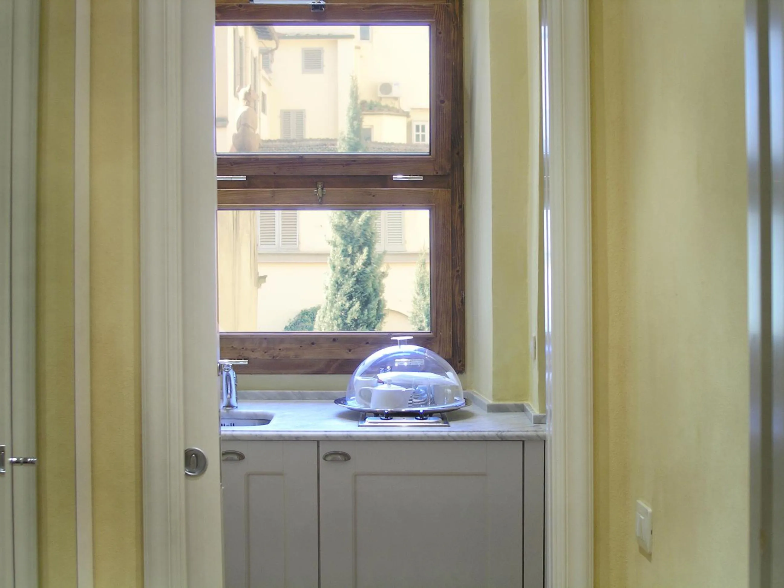 Kitchen or kitchenette in Piccolo Residence Apart-Hotel