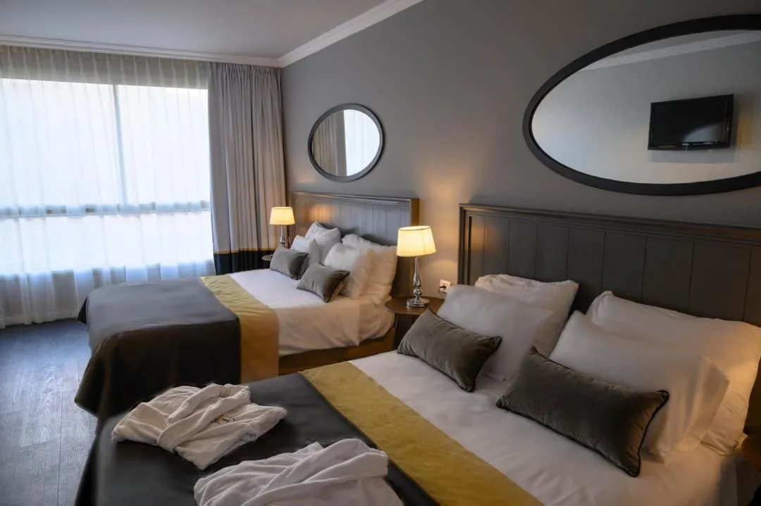 Bed in Royal Plaza Hotel