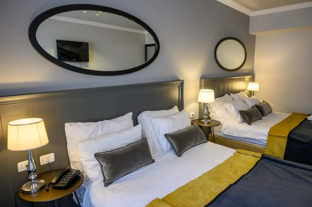 Bed in Royal Plaza Hotel