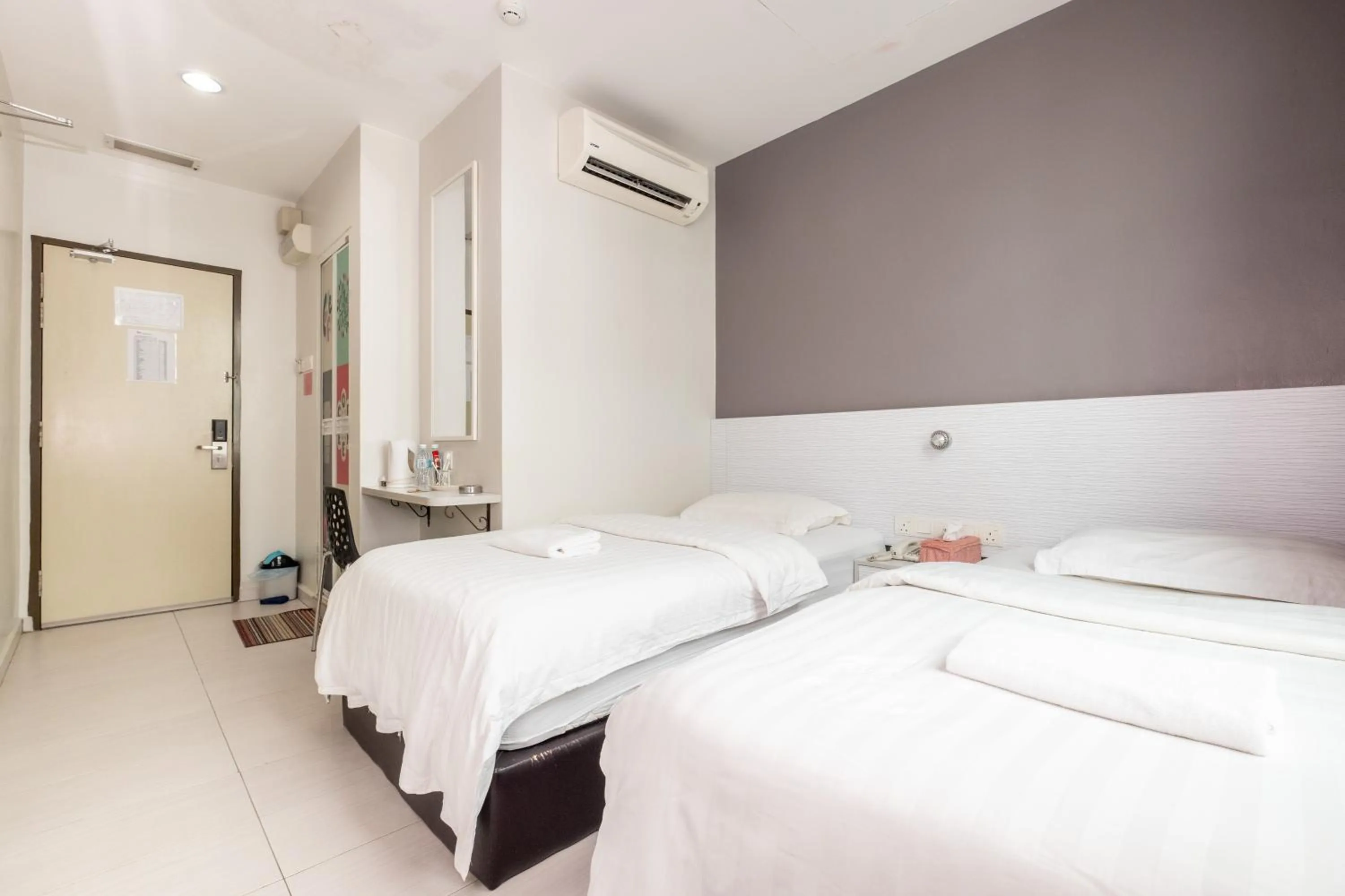 Bed in BG Business Hotel