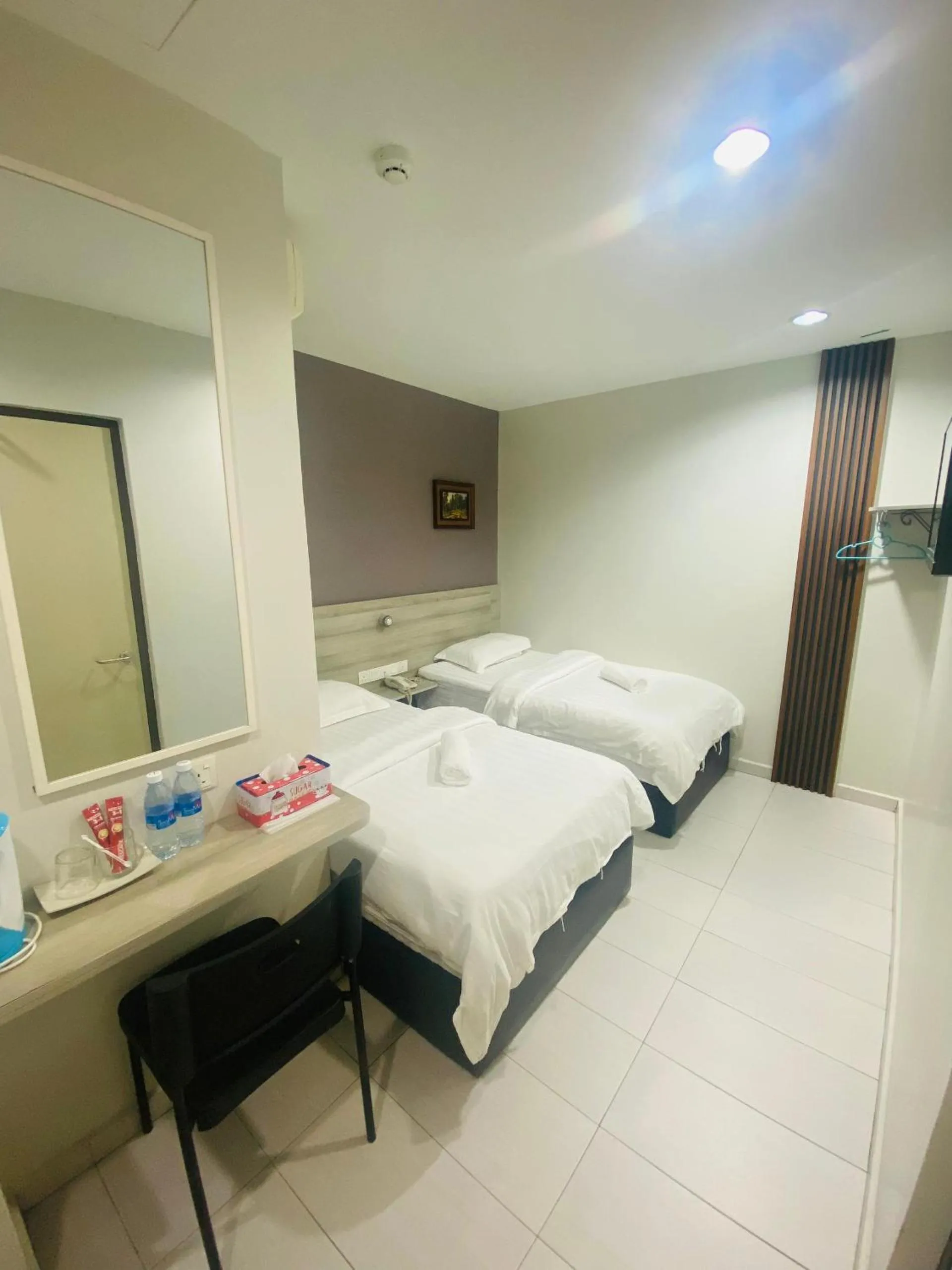 Bed in BG Business Hotel