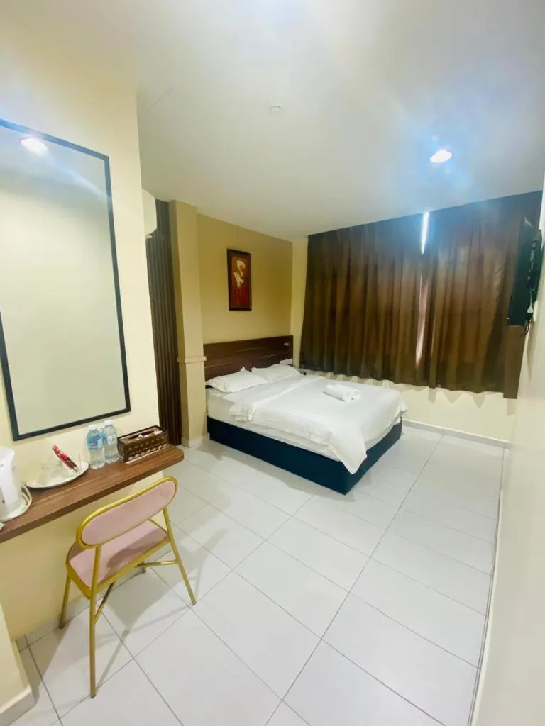 Bed in BG Business Hotel