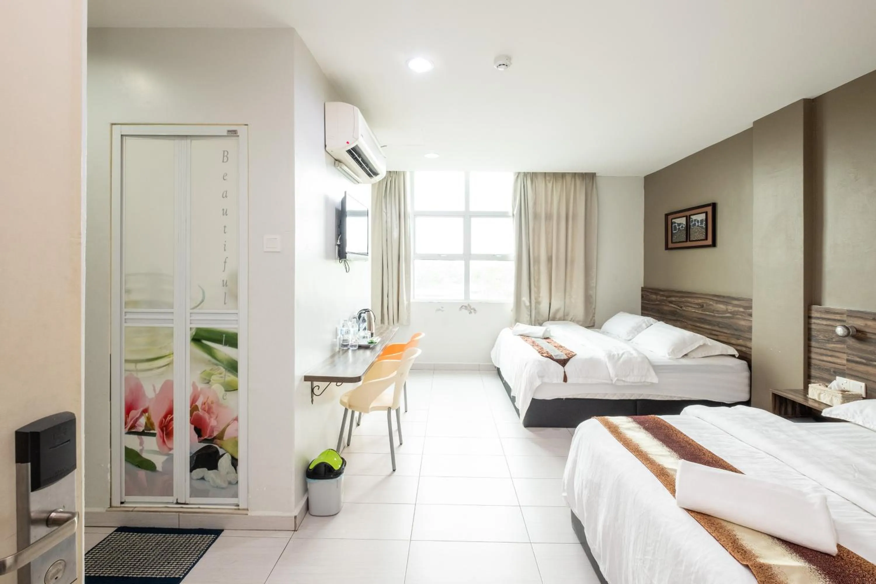 Bed in BG Business Hotel