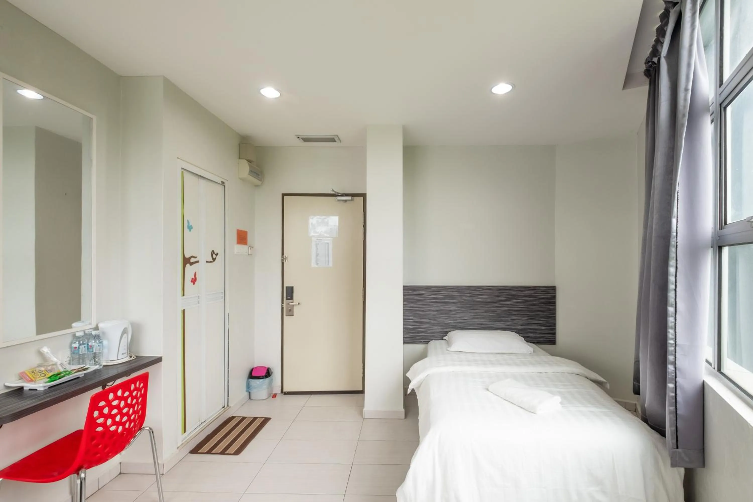 Bed in BG Business Hotel