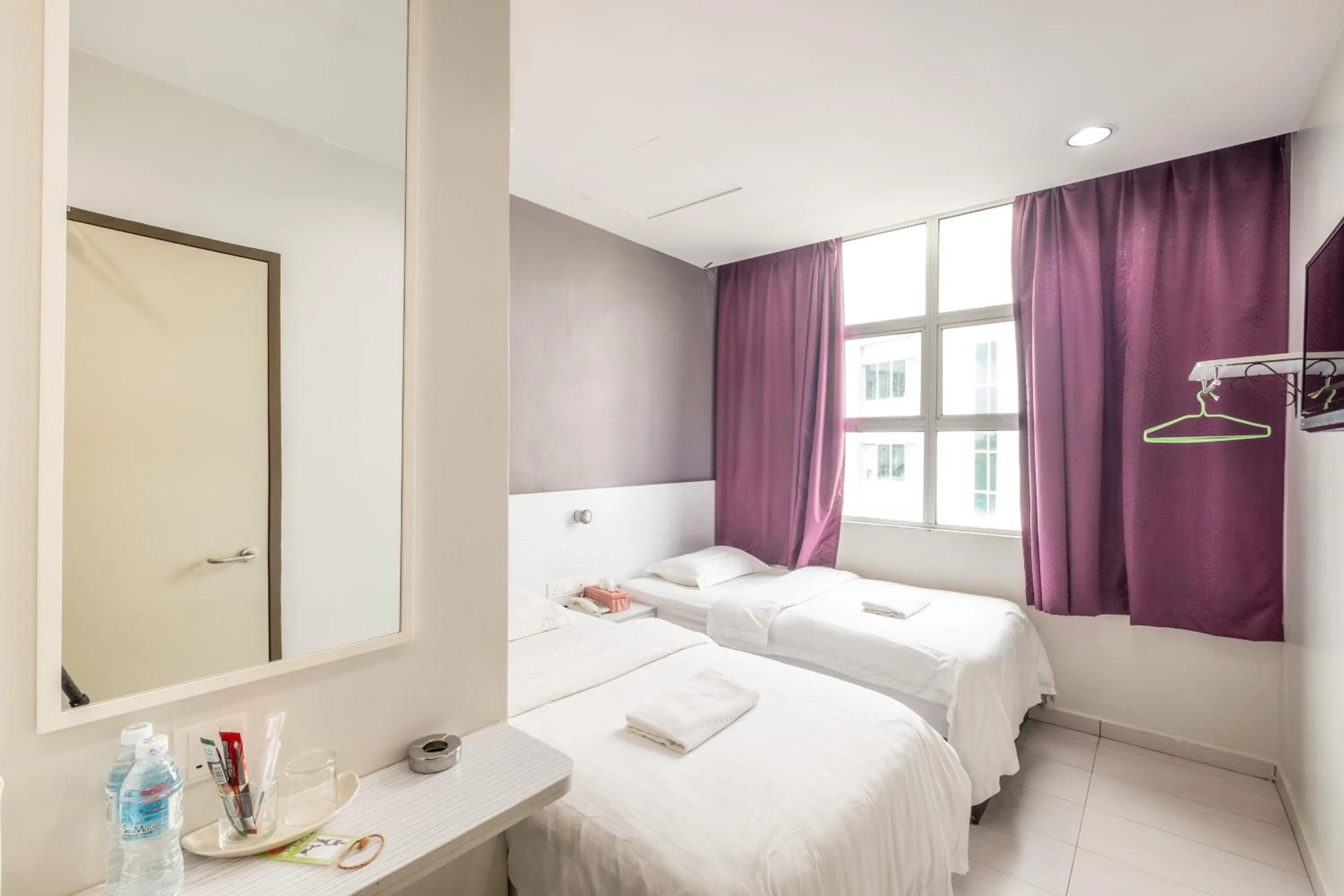 Bed in BG Business Hotel